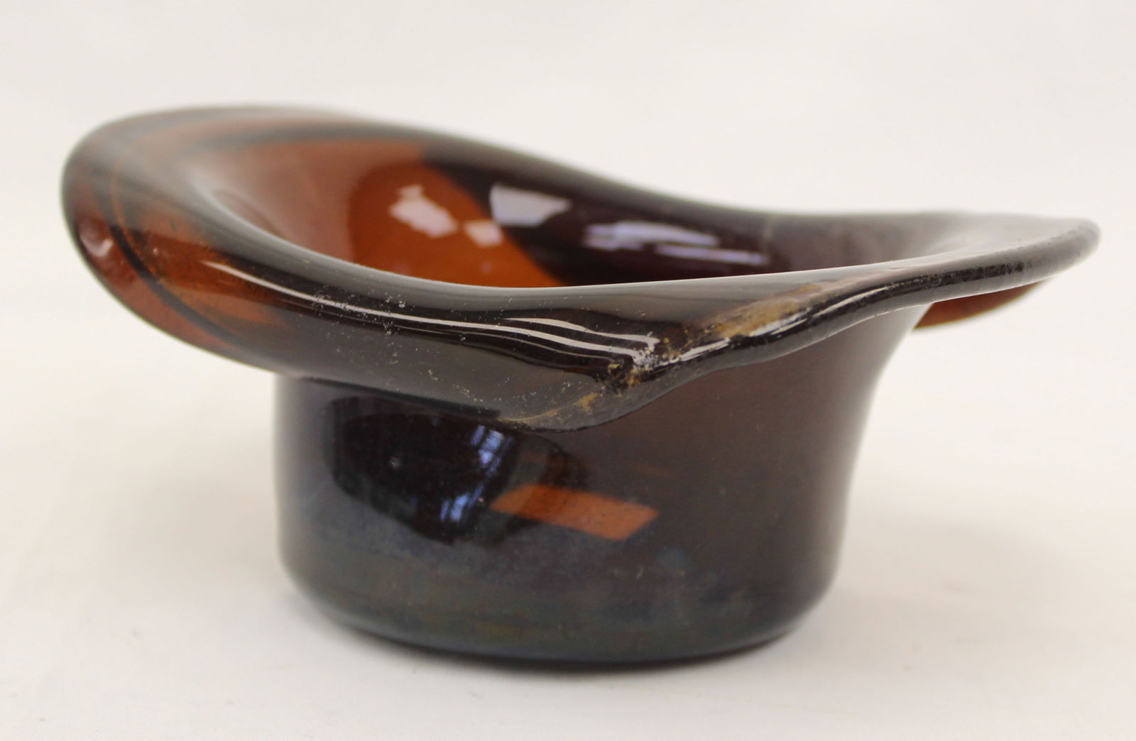 Early amber glass hat - 2 1/2" tall x 6"x4": Early amber glass hat - 2 1/2" tall x 6"x4"