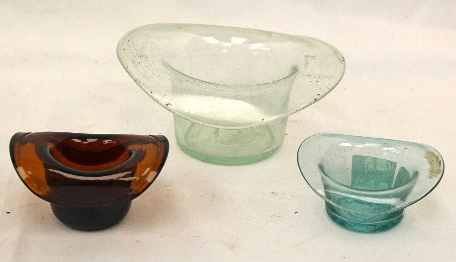Lot of 3 early glass hats in aqua & amber - smallest 1 3/4" tall x 2 3/4"x2 1/2" - amber 1 (1 of 9)