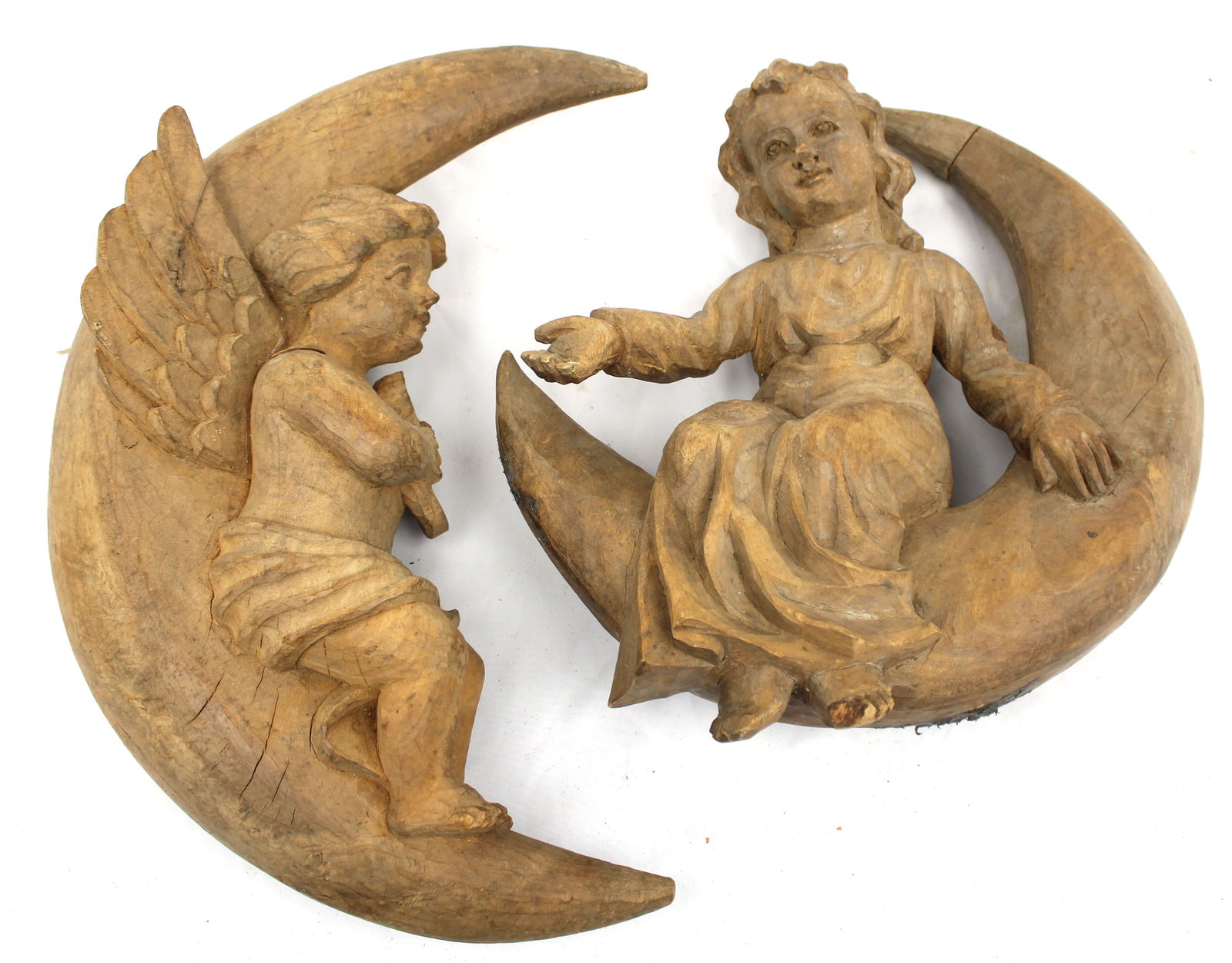 Lot of 2 carved figural wall hangings of a cherub & a child on the moon - 17"x14" & 10"x18": Lot of 2 carved figural wall hangings of a cherub & a child on the moon - 17"x14" & 10"x18"