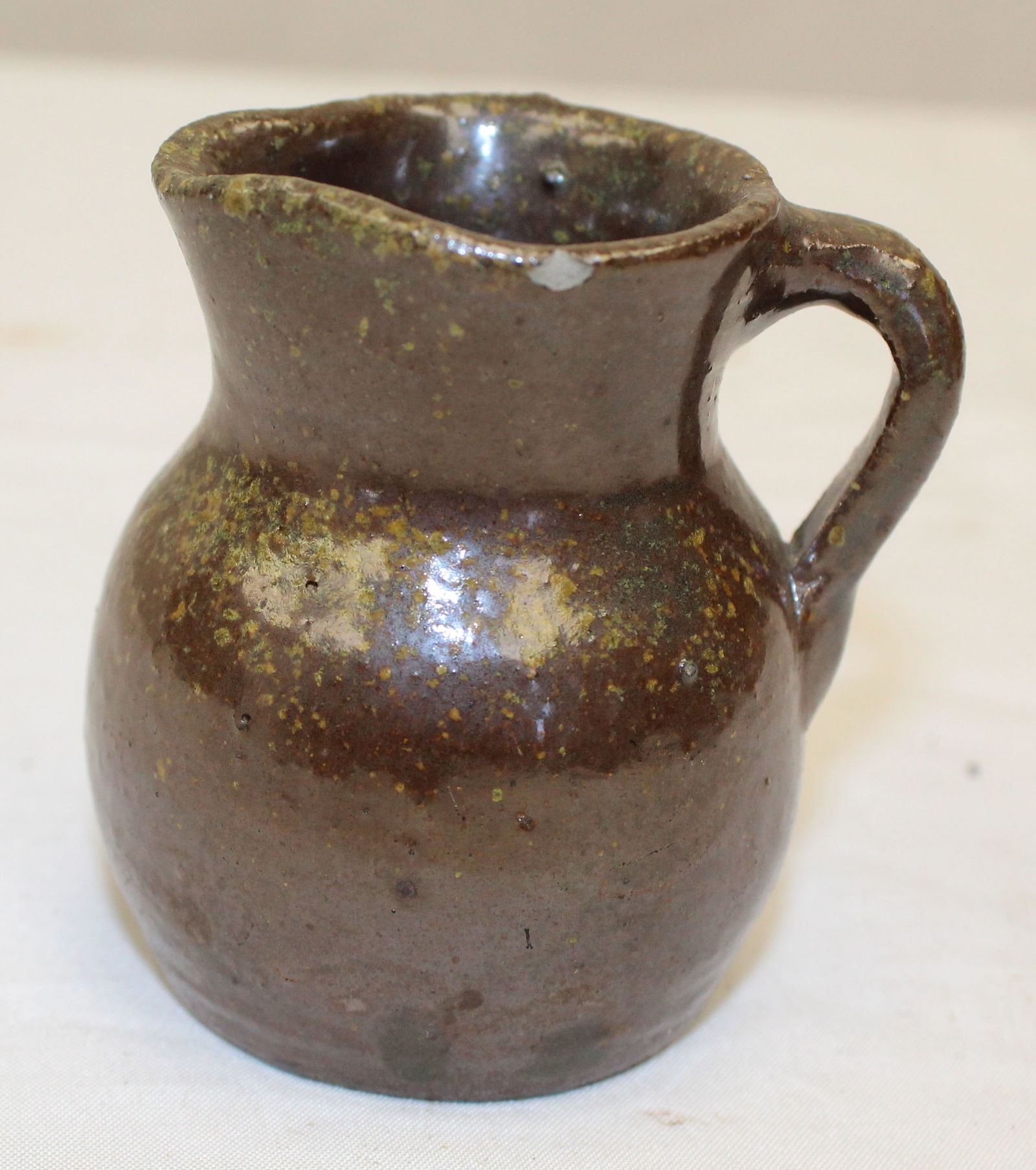Antique redware small creamer/pitcher - 2 1/2" tall (1 of 5)