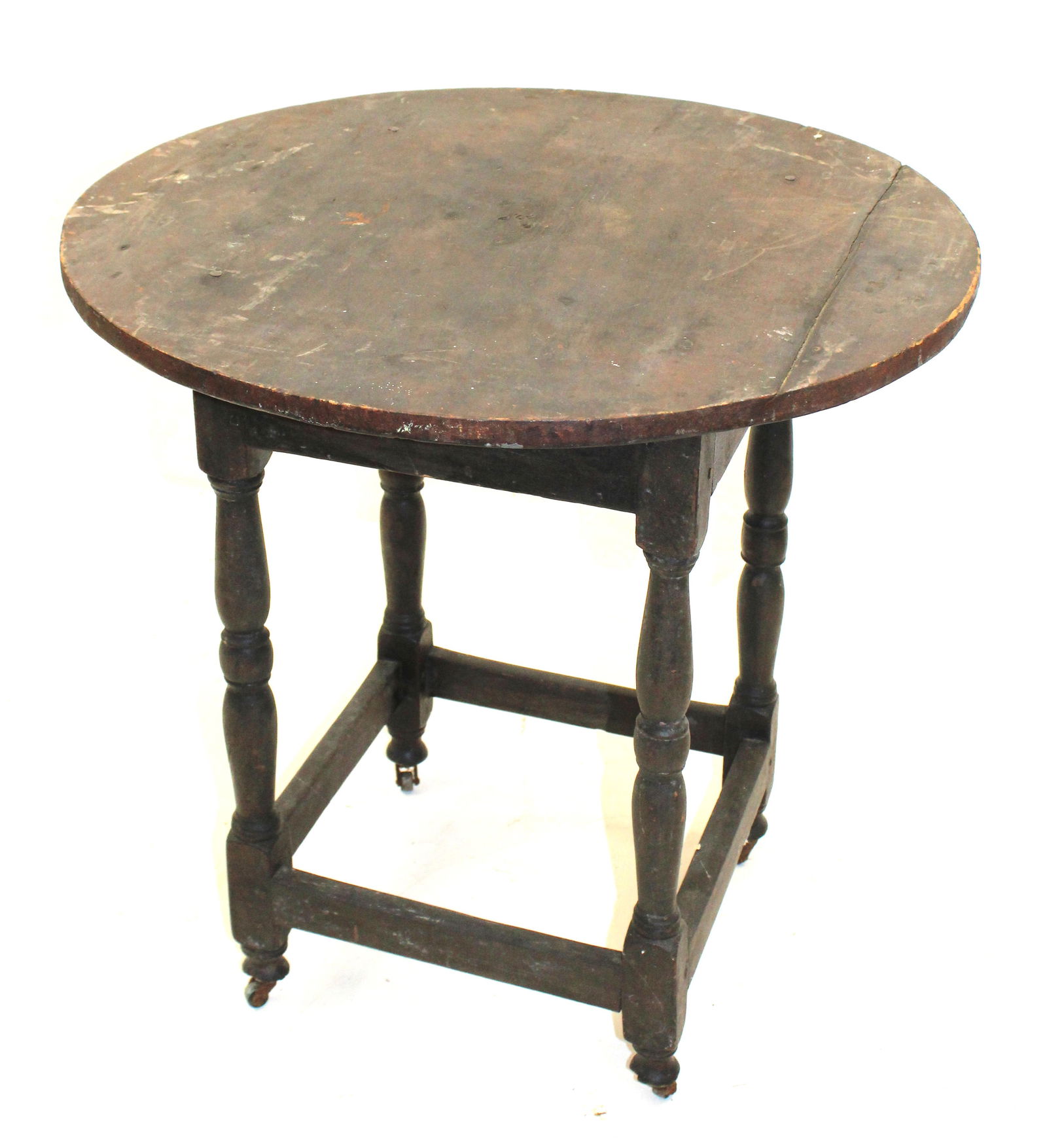 18thC American round top tavern table on stretcher base in black over old red paint - 25" tall x 25: 18thC American round top tavern table on stretcher base in black over old red paint - 25" tall x 25 1/2" diam top