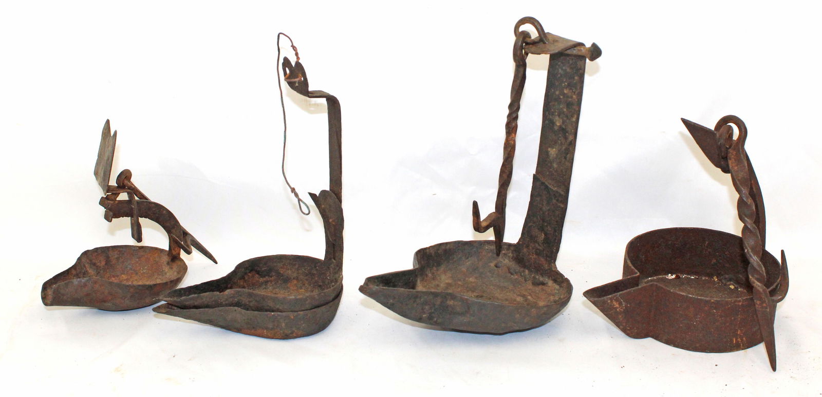 Lot of 4 antique betty lamps - 9"x8" largest - 6 1/2"x5" smallest: Lot of 4 antique betty lamps - 9"x8" largest - 6 1/2"x5" smallest