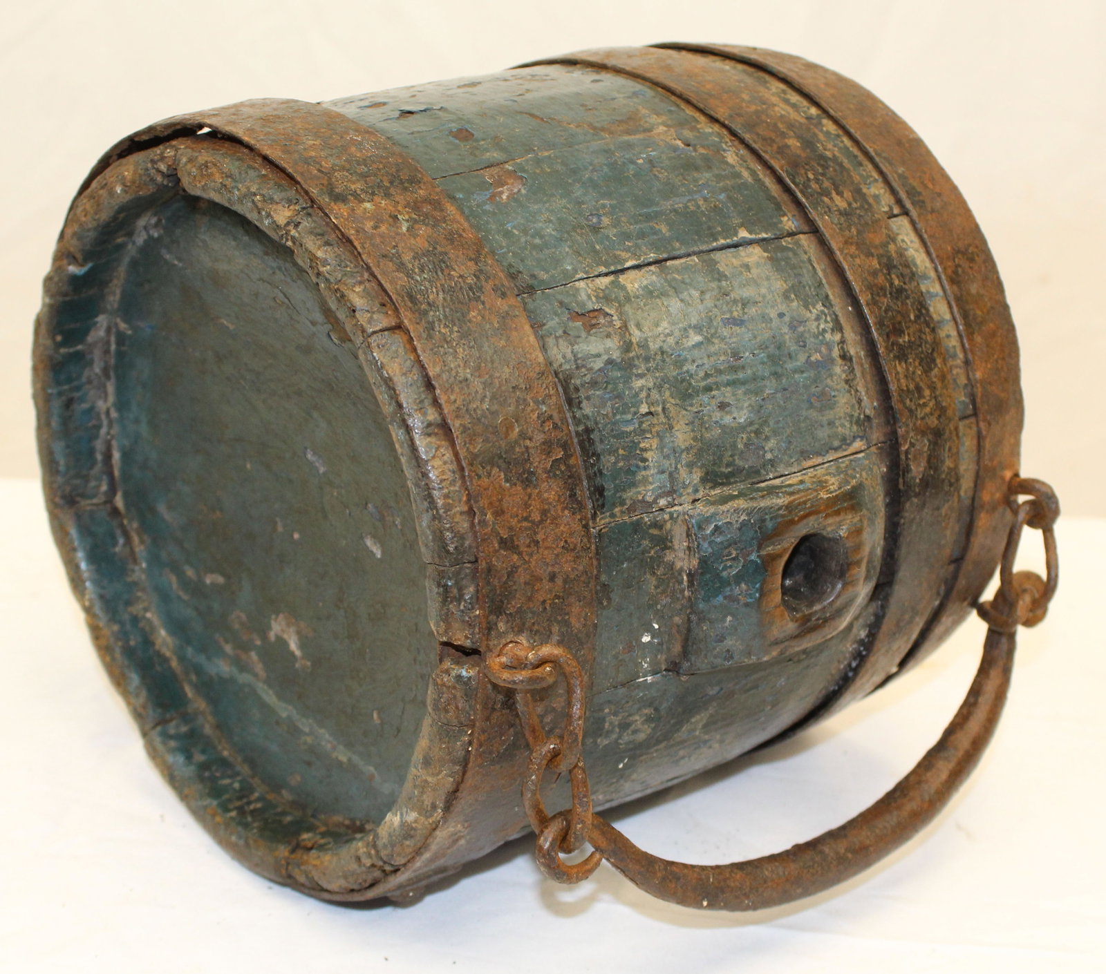 Antique wooden canteen in green paint w iron banding & handle - 8" tall x 8 1/2" diam: Antique wooden canteen in green paint w iron banding & handle - 8" tall x 8 1/2" diam