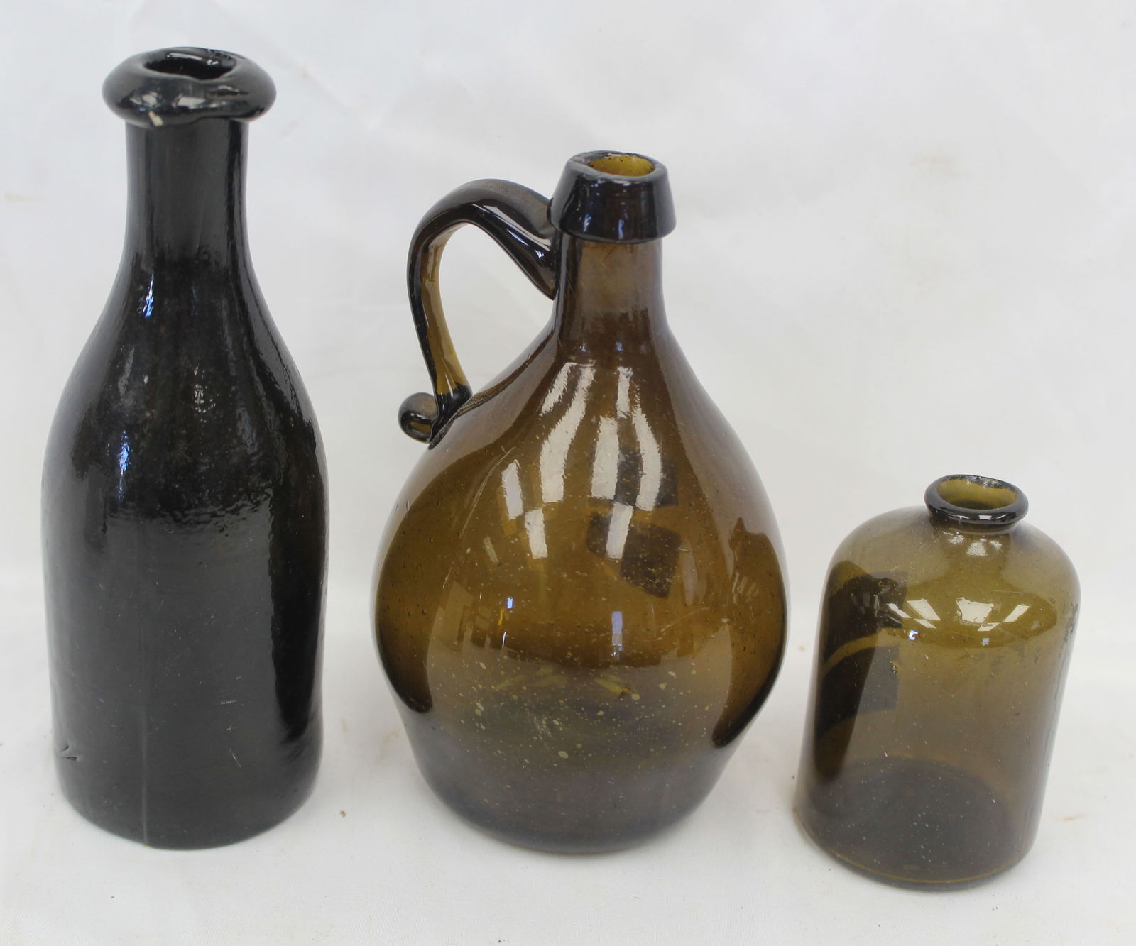 Lot of 3 early amber glass bottles & cruet - 3 3/4", 6 1/2" & 7 1/4": Lot of 3 early amber glass bottles & cruet - 3 3/4", 6 1/2" & 7 1/4"