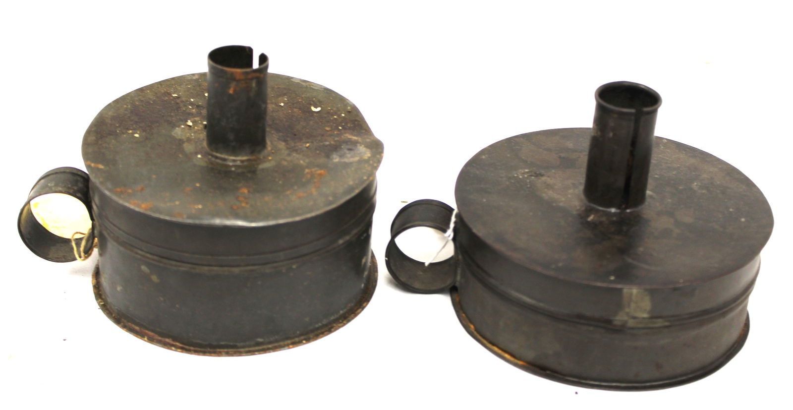 Lot of 2 antique round tin tinder boxes - 3 1/2" tall x 4" diam & 4" tall x 4 1/2" diam (1 of 5)