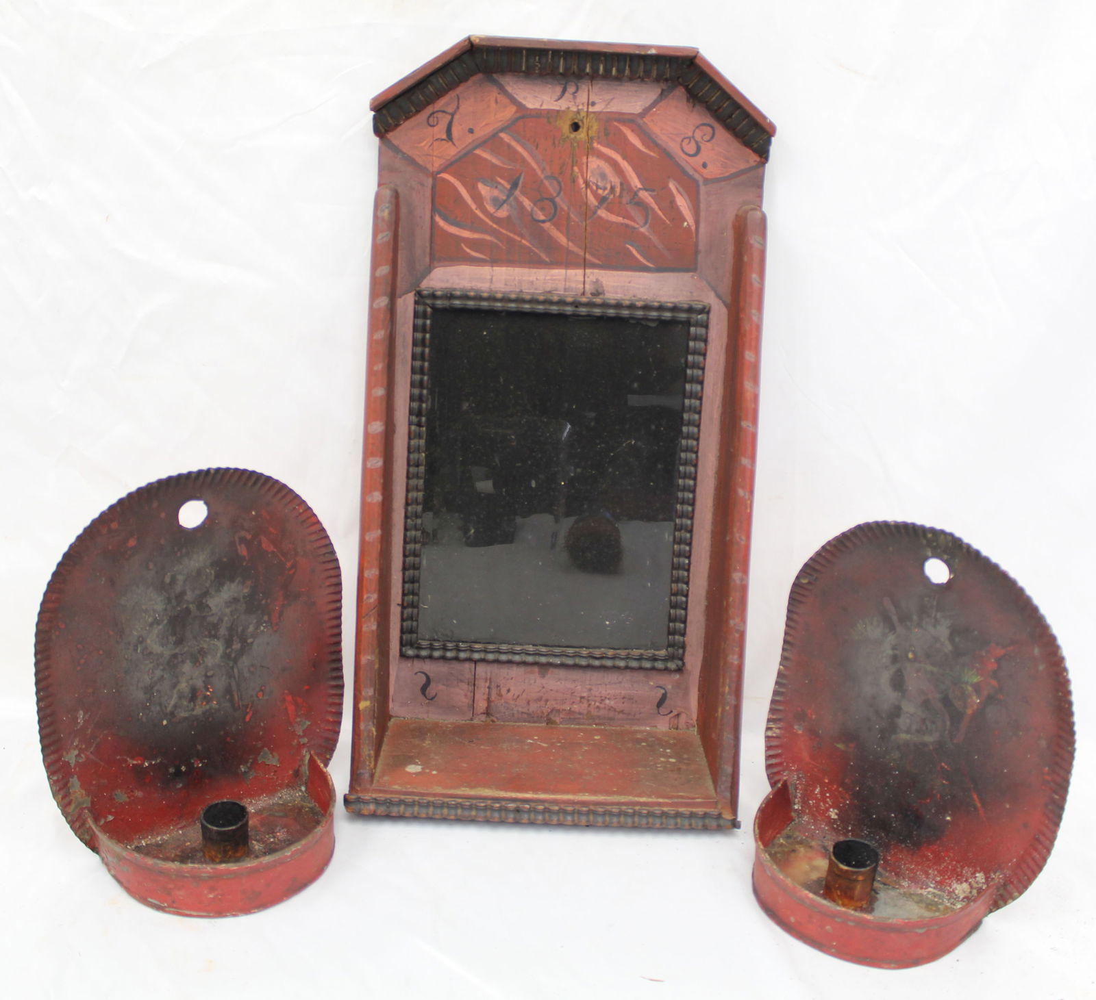 Lot of 3 pieces antique toleware in red paint incl pr of wall candle sconces & a wall shelf w mirror: Lot of 3 pieces antique toleware in red paint incl pr of wall candle sconces & a wall shelf w mirror - 17" tall x 9" wide x 4 1/2" deep shelf & 9" tall x 7" wide sconces