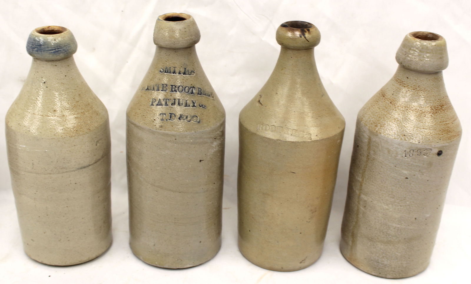 Lot of 4 antique stoneware bottles - 9"-10" tall (1 of 7)