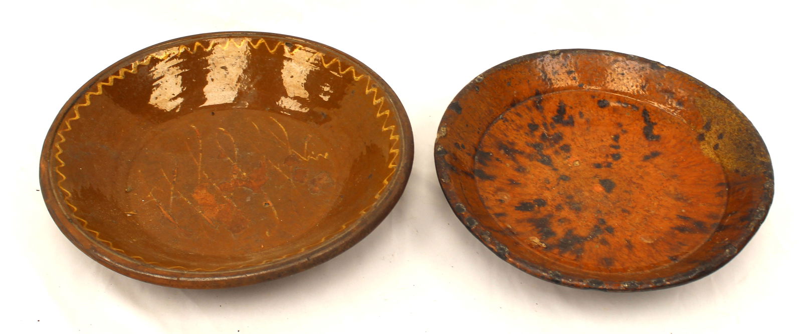 Lot of 2 antique redware plates/chargers - 11" & 12" diam (1 of 7)