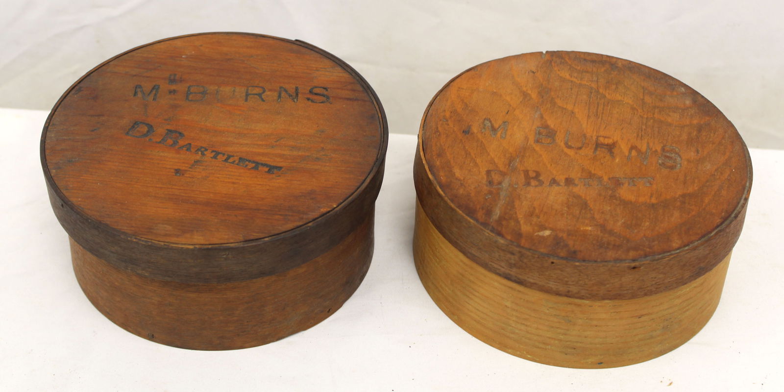 Lot of 2 antique Hingham round pantry boxes with "M. Burns" & "D. Bartlett" stamp on lids - 3" tall (1 of 7)