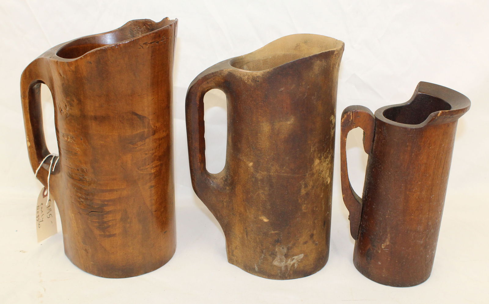 Lot of 3 antique wooden pitchers - 8 1/4" - 11" tall: Lot of 3 antique wooden pitchers - 8 1/4" - 11" tall