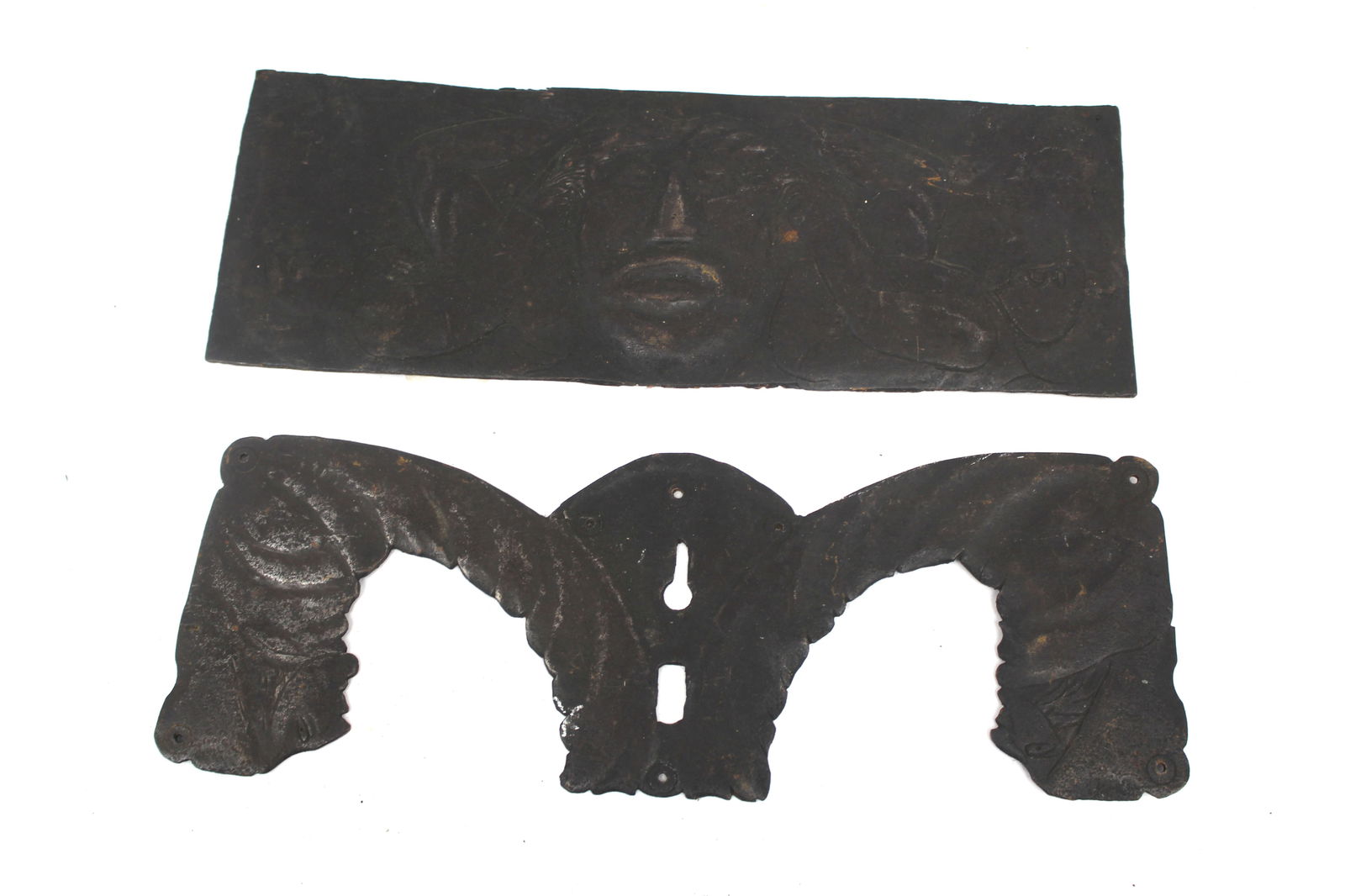 Lot of 2 antique iron items incl lock face plate & decorative plaque w figural/face motif - 3 1/4": Lot of 2 antique iron items incl lock face plate & decorative plaque w figural/face motif - 3 1/4" tall x 13" wide & 5" tall x 13 1/2" wide