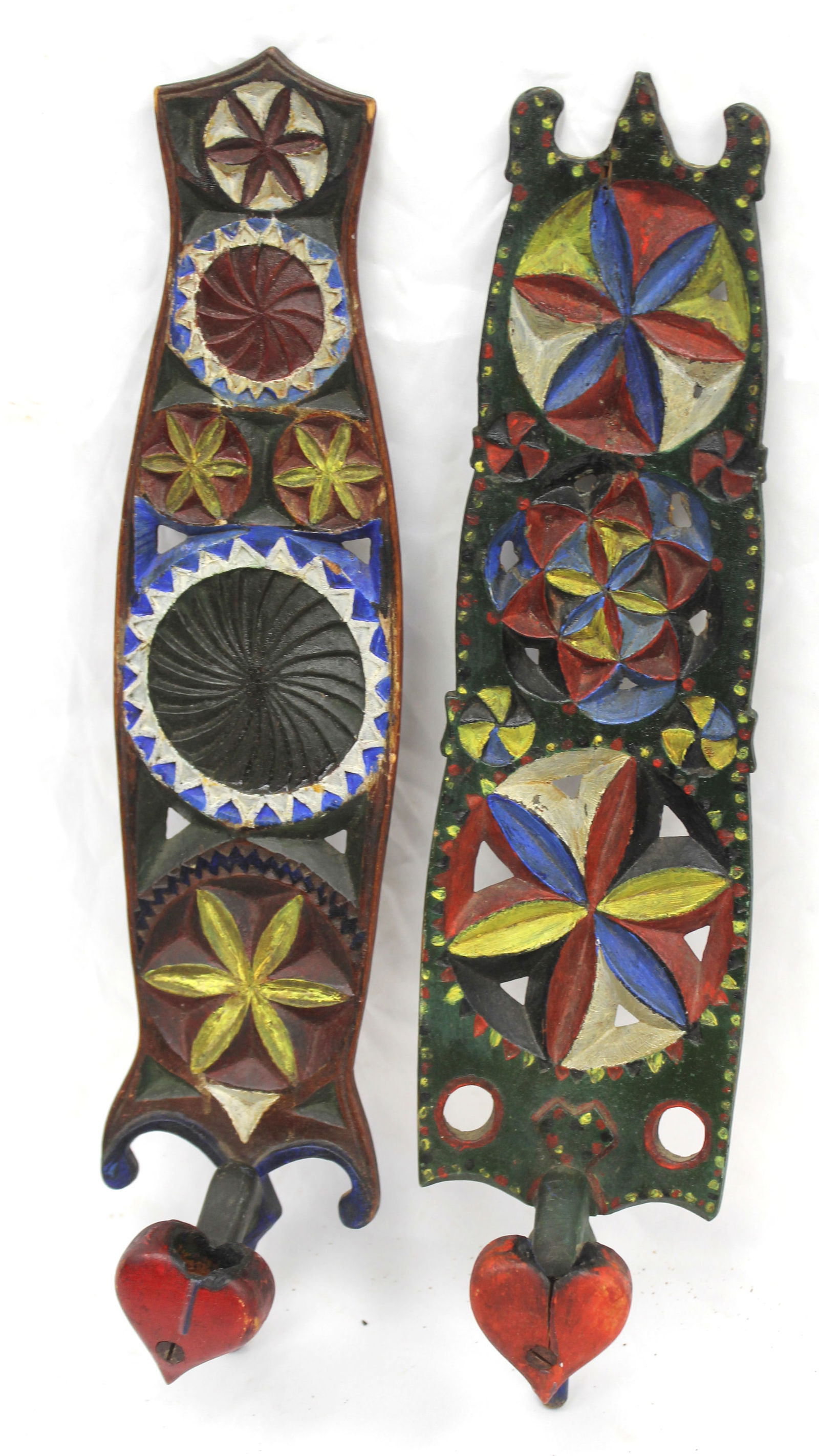 Near pair of carved wood & vibrantly painted wall candle sconces w heart motif - 17 1/4" - 17 1/2": Near pair of carved wood & vibrantly painted wall candle sconces w heart motif - 17 1/4" - 17 1/2" tall