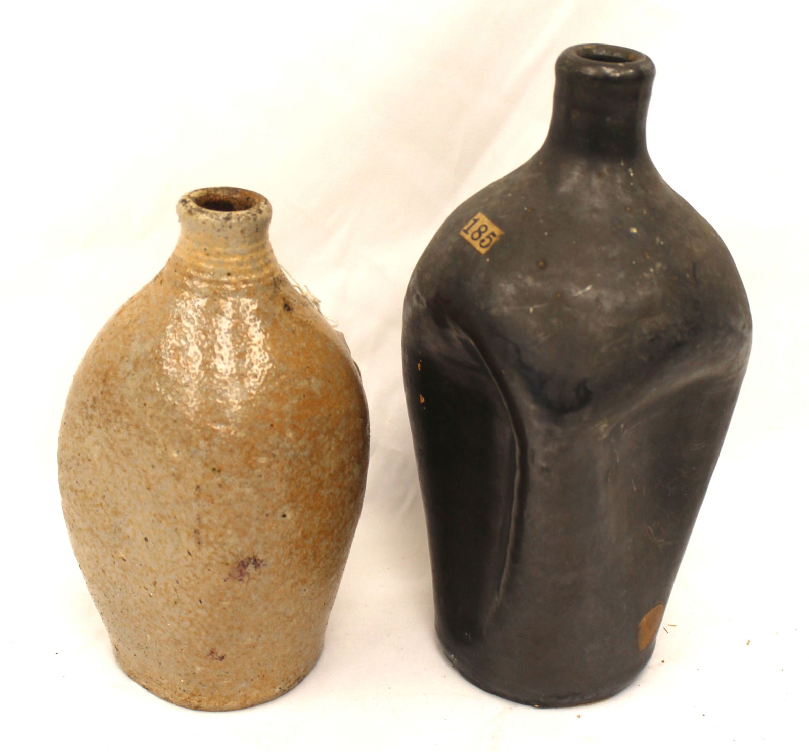 Lot of 2 antique stoneware pinched sided bottles - 8" & 10 1/4" tall: Lot of 2 antique stoneware pinched sided bottles - 8" & 10 1/4" tall