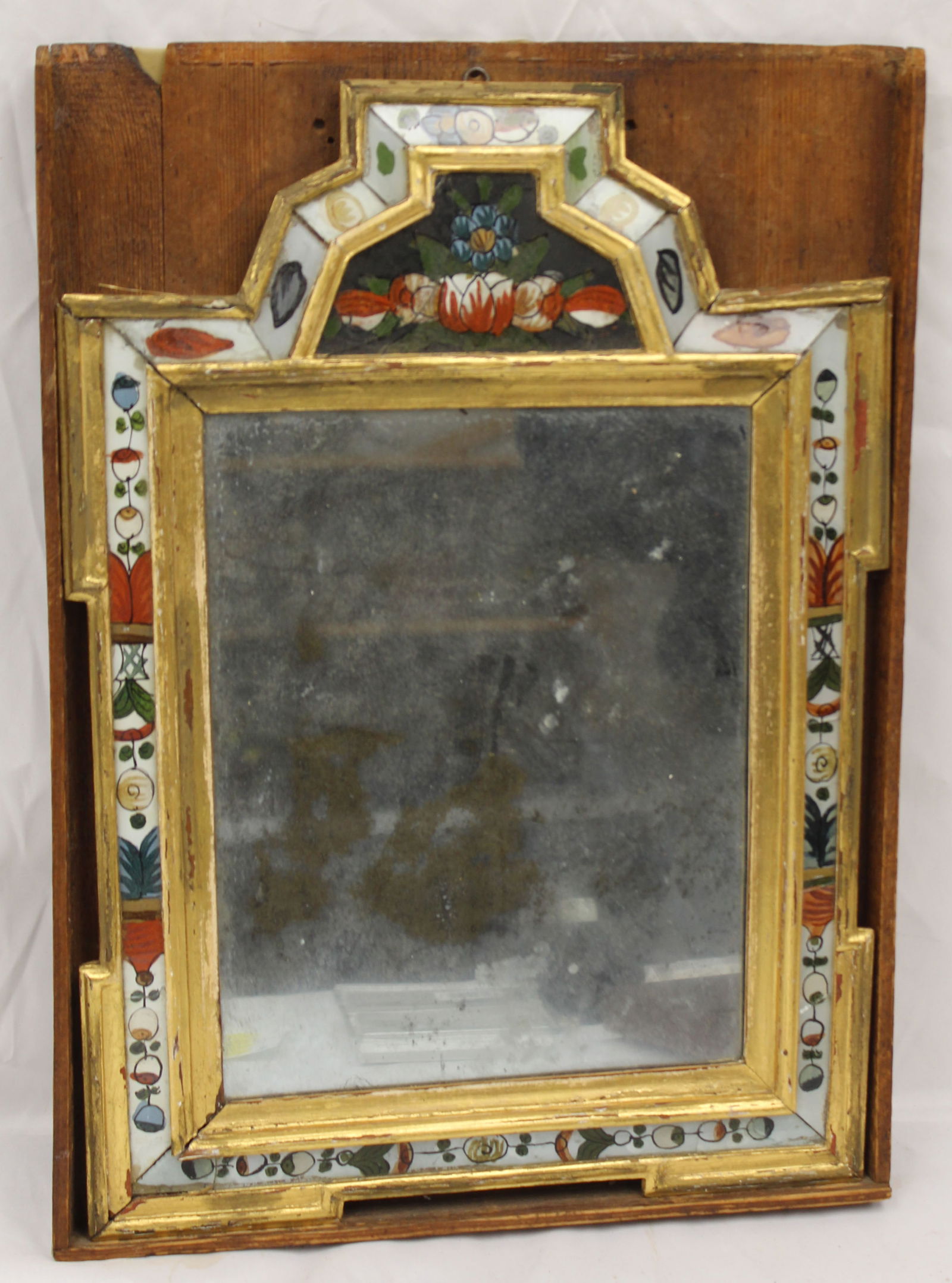 Antique mirror w reverse paint decorated & gilt painted wooden border mounted in protective wooden: Antique mirror w reverse paint decorated & gilt painted wooden border mounted in protective wooden frame - 18"x12 1/2"