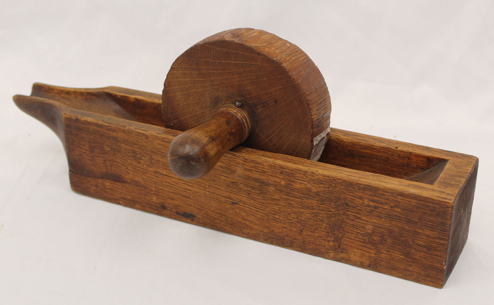 Antique wooden herb grinder - 3 1/2" tall x 13 1/2" long x 3 1/2" w 4 1/2" diam wheel (1 of 2)