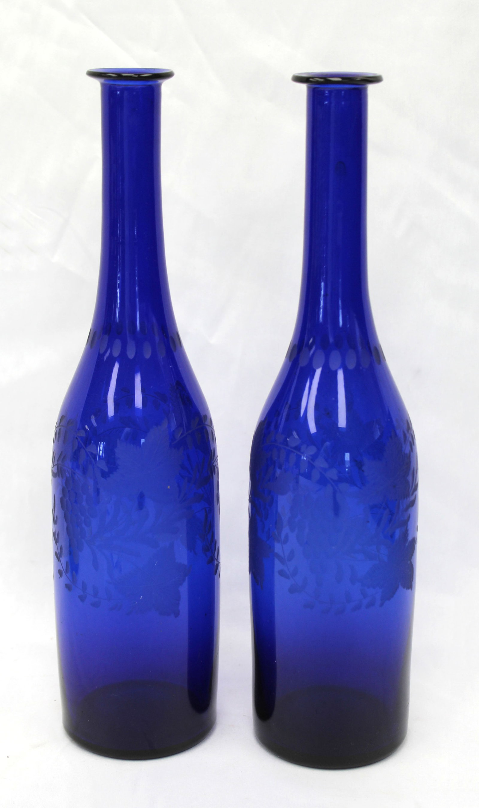 Early cobalt glass 12" tall bottles: Early cobalt glass 12" tall bottles