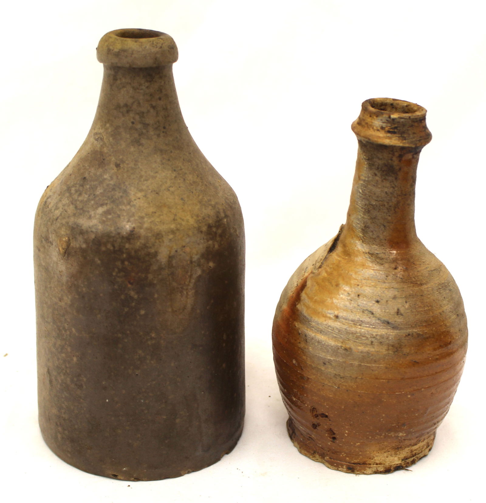 Lot of 2 antique stoneware bottles - 7" & 8" tall: Lot of 2 antique stoneware bottles - 7" & 8" tall