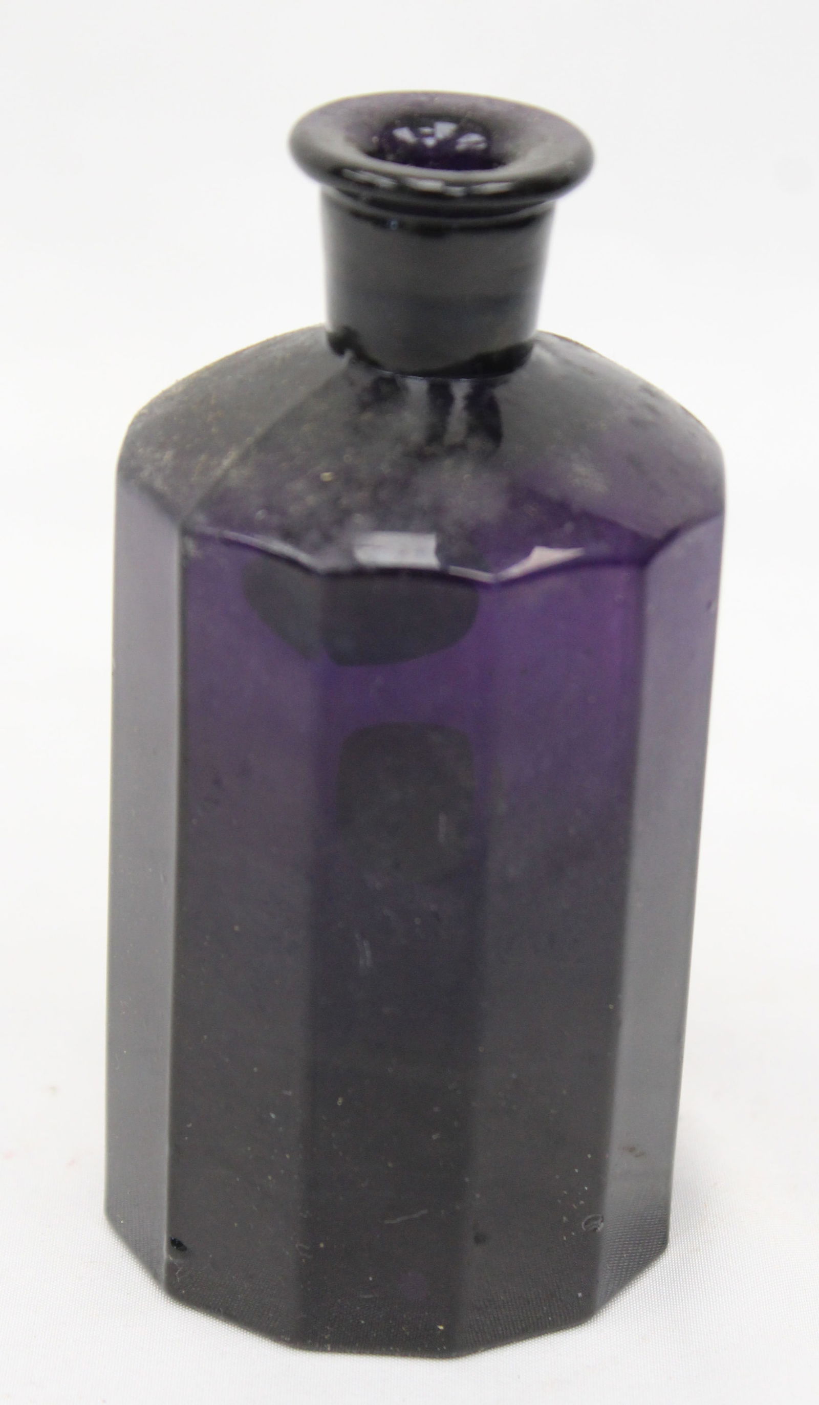 Early amethyst glass small bottle/ink - 4 3/4" tall: Early amethyst glass small bottle/ink - 4 3/4" tall