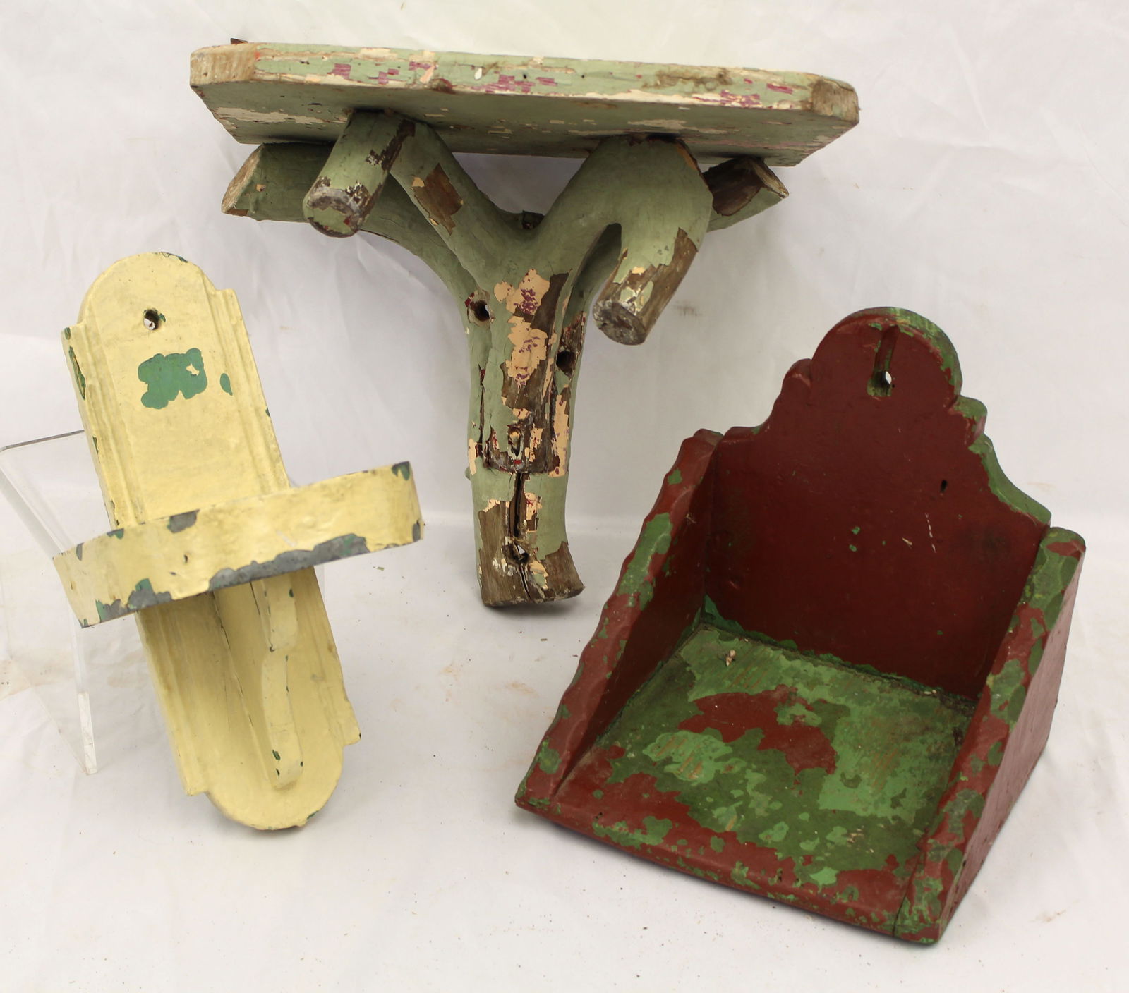 Lot of 3 Folky wall shelves in paint decoration - a green Adirondack example 9" tall x 11 3/4" wide: Lot of 3 Folky wall shelves in paint decoration - a green Adirondack example 9" tall x 11 3/4" wide x 12 3/4" deep, a creamy yellow example w painted tin shelf 11 1/2" tall x 6 1/2" wide x 6" wide & r