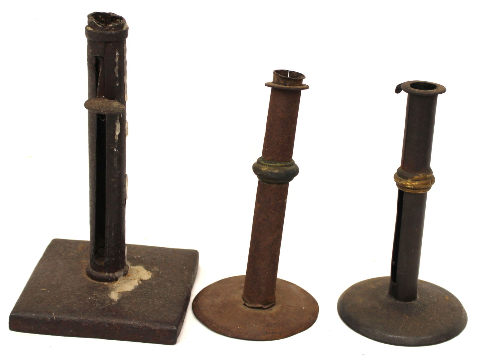 Lot of 3 antique candlesticks incl 2 wedding band tin hogscrapers plus an iron push up on square (1 of 8)