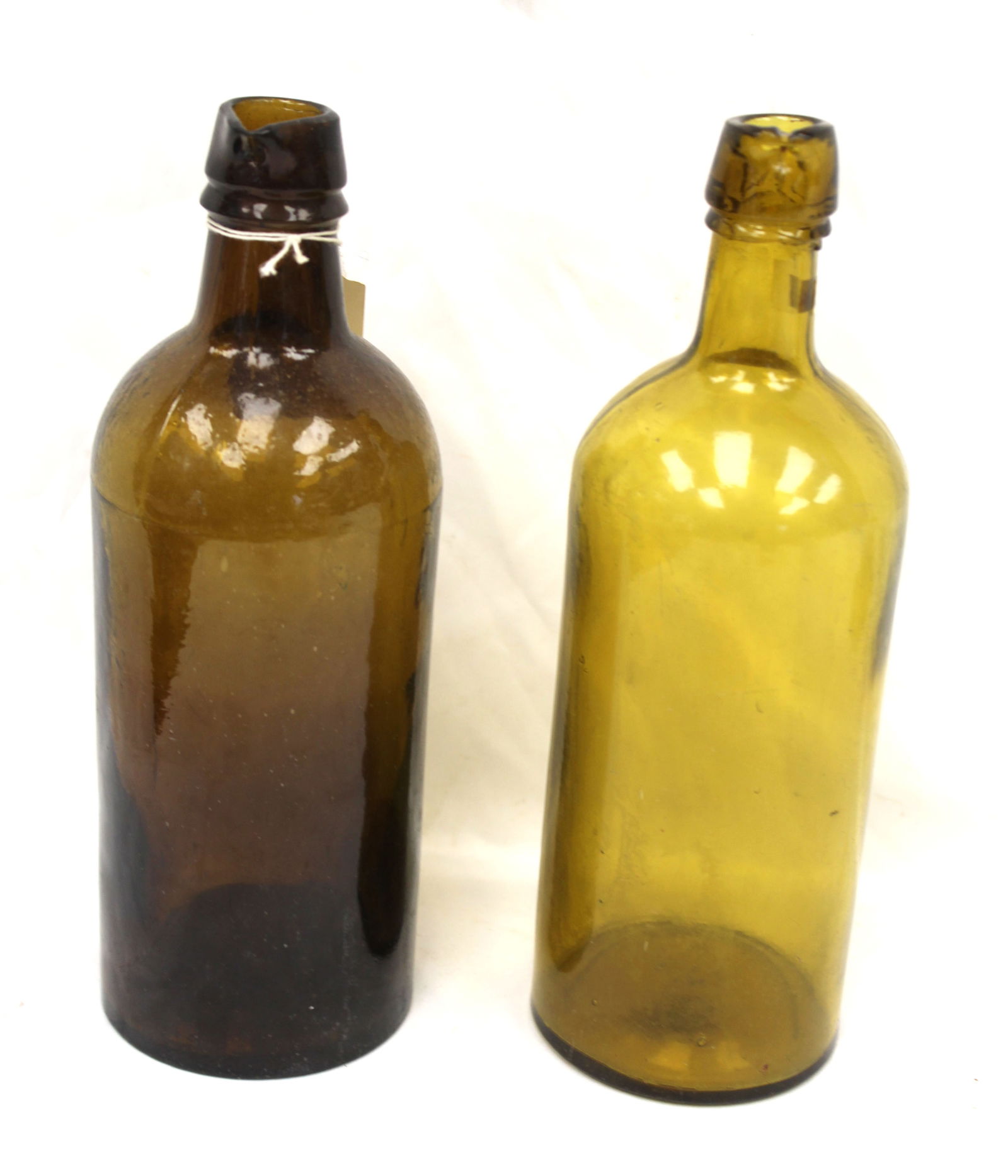 Lot of 2 early amber glass bottles - 9 1/2" & 9 3/4" tall (1 of 7)