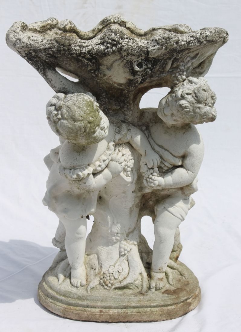 wonderful form small cast coral stone ca 1920 bird bath: wonderful form small cast coral stone ca 1920 bird bath w scalloped shell basin above 2 cherubs w grape clusters on stepped shaped base - nice detailed casting - from a magnificent old Florida waterfr