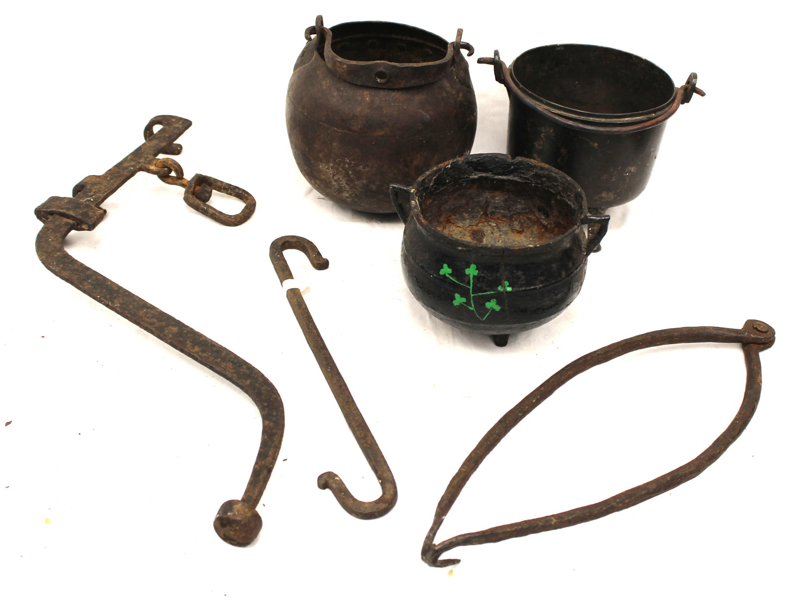 Lot of 2 antique cast iron kettles plus a brass or bronze kettle & a cast iron hook & pot tipper & (1 of 9)