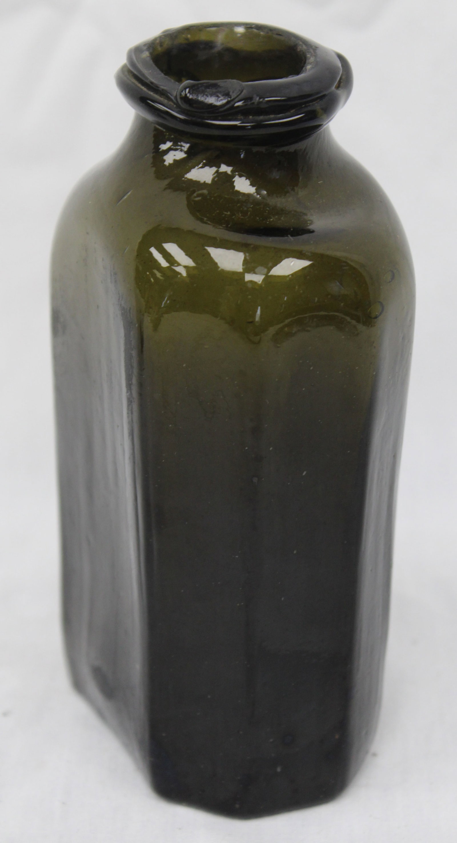 Early dark green glass hexagonal utility bottle - 5 1/2" tall - 7