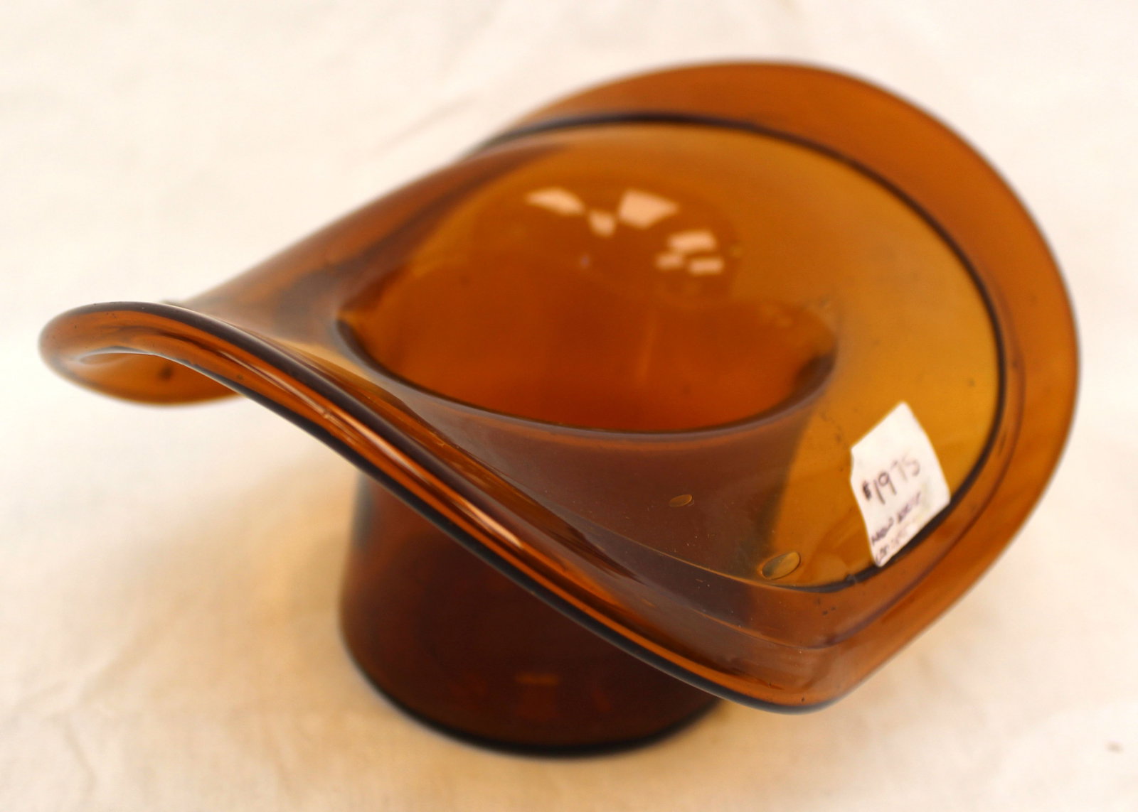 Early amber glass hat - large size 3 1/2" tall x 8"x6": Early amber glass hat - large size 3 1/2" tall x 8"x6"