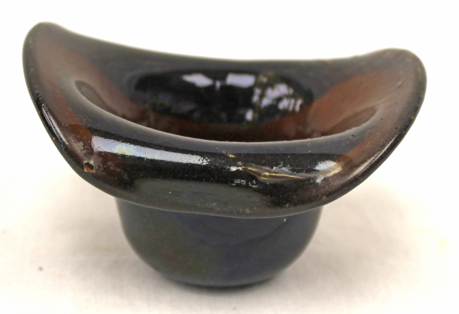 Early amber glass hat - 2" tall x 3 1/2"x2 1/2": Early amber glass hat - 2" tall x 3 1/2"x2 1/2"