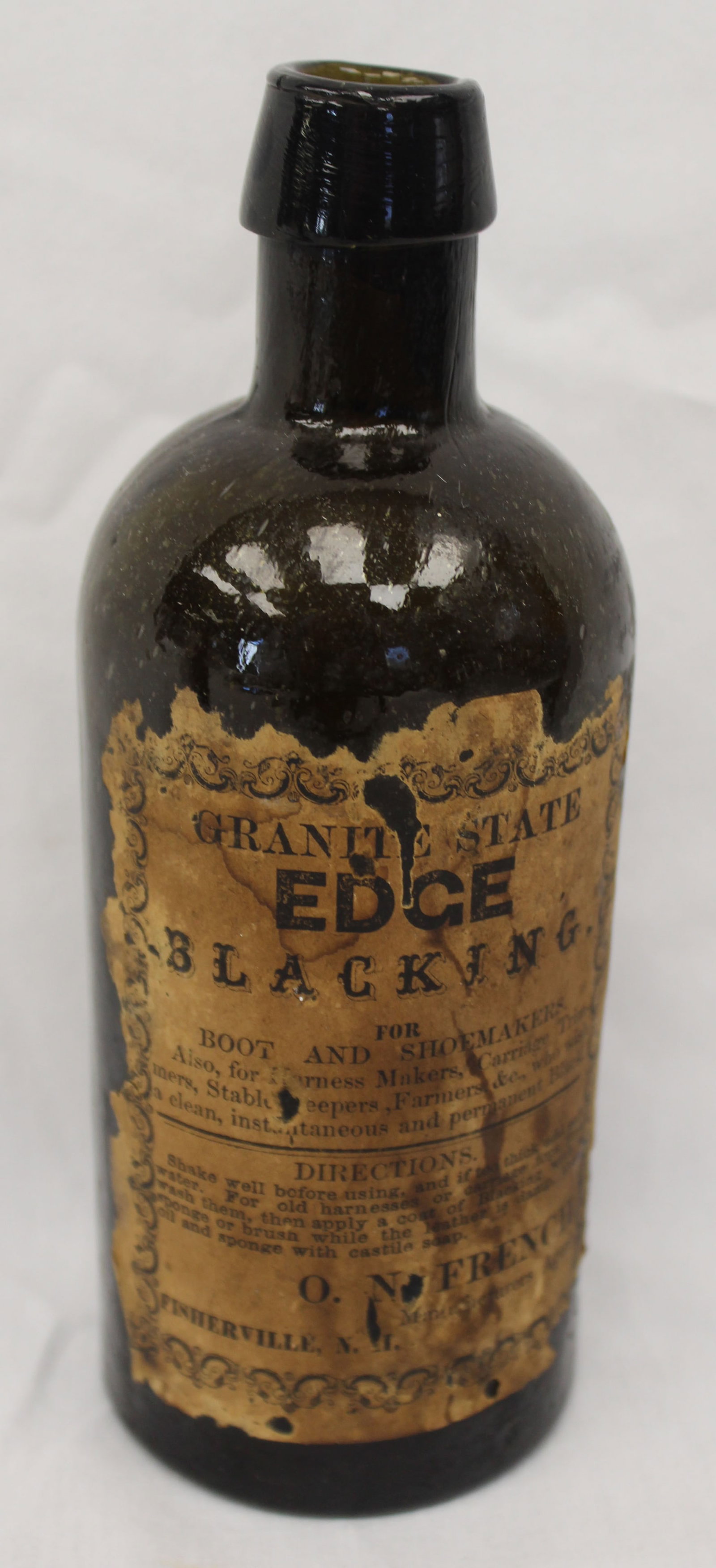 Early amber glass bottle w orig label "Granite State Edge Blacking" - 7 1/2" tall: Early amber glass bottle w orig label "Granite State Edge Blacking" - 7 1/2" tall