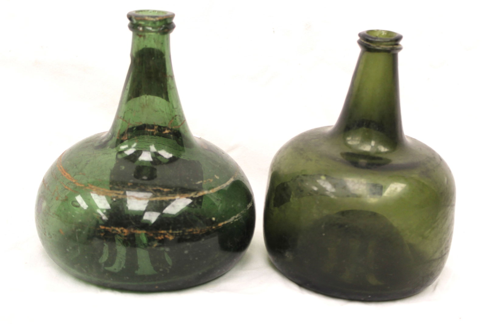 Lot of 2 early green glass bottles - 6 1/2" & 7" tall: Lot of 2 early green glass bottles - 6 1/2" & 7" tall