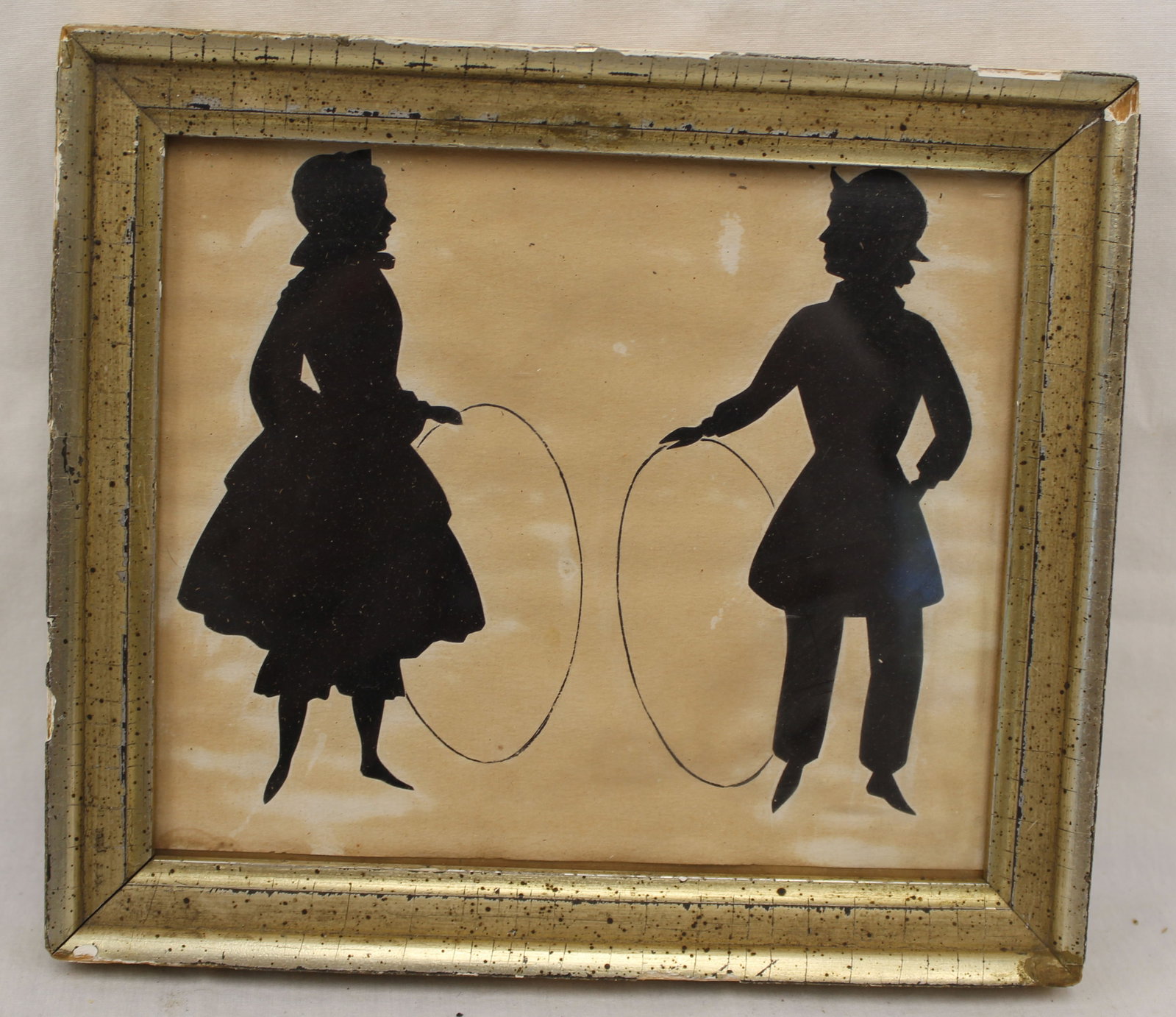 Antique framed cut silhouette of a girl & boy holding hoops - overall framed size 7"x8" (1 of 5)