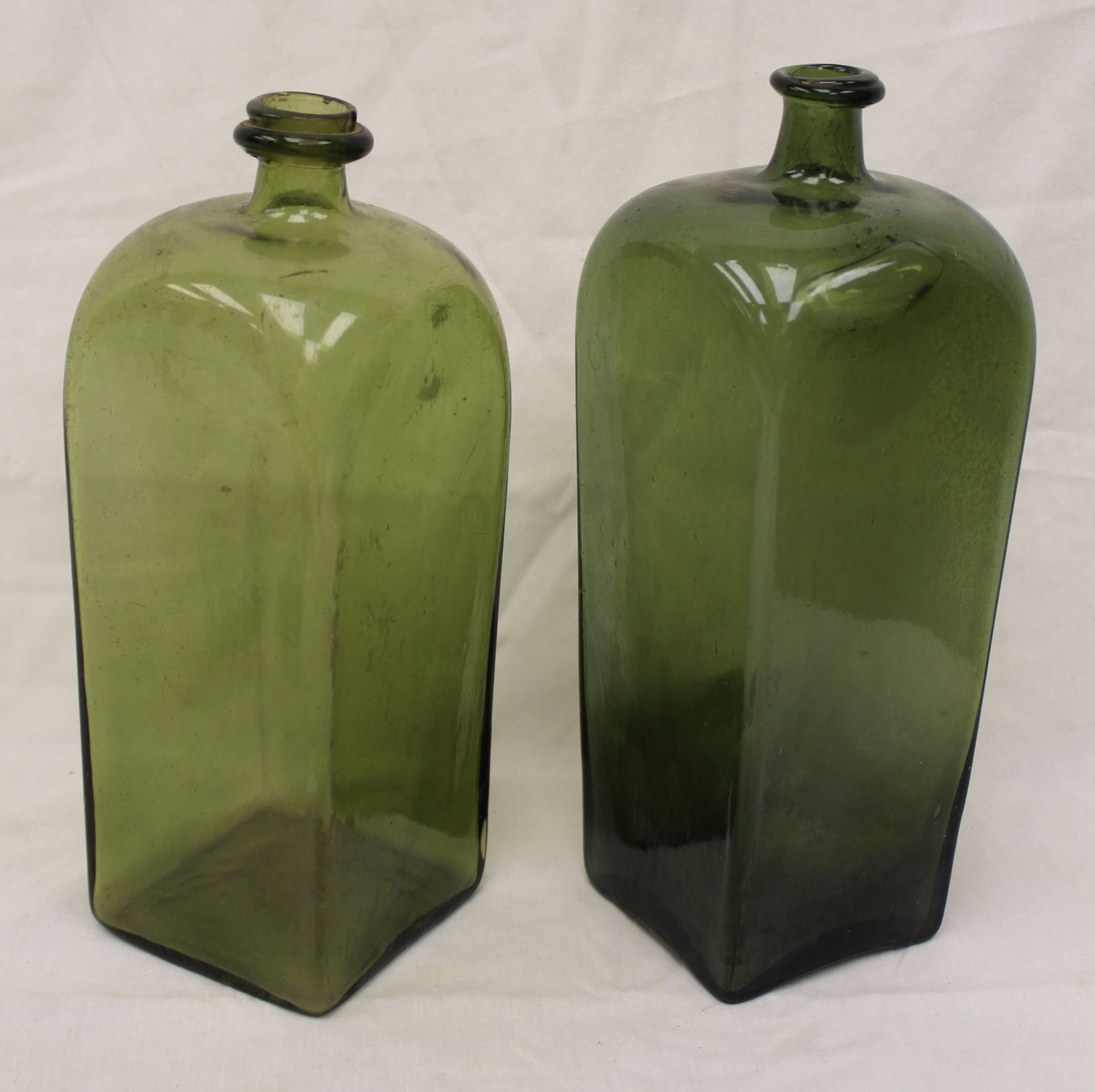 Lot of 2 early green glass gin bottles - 12"&11" tall: Lot of 2 early green glass gin bottles - 12"&11" tall