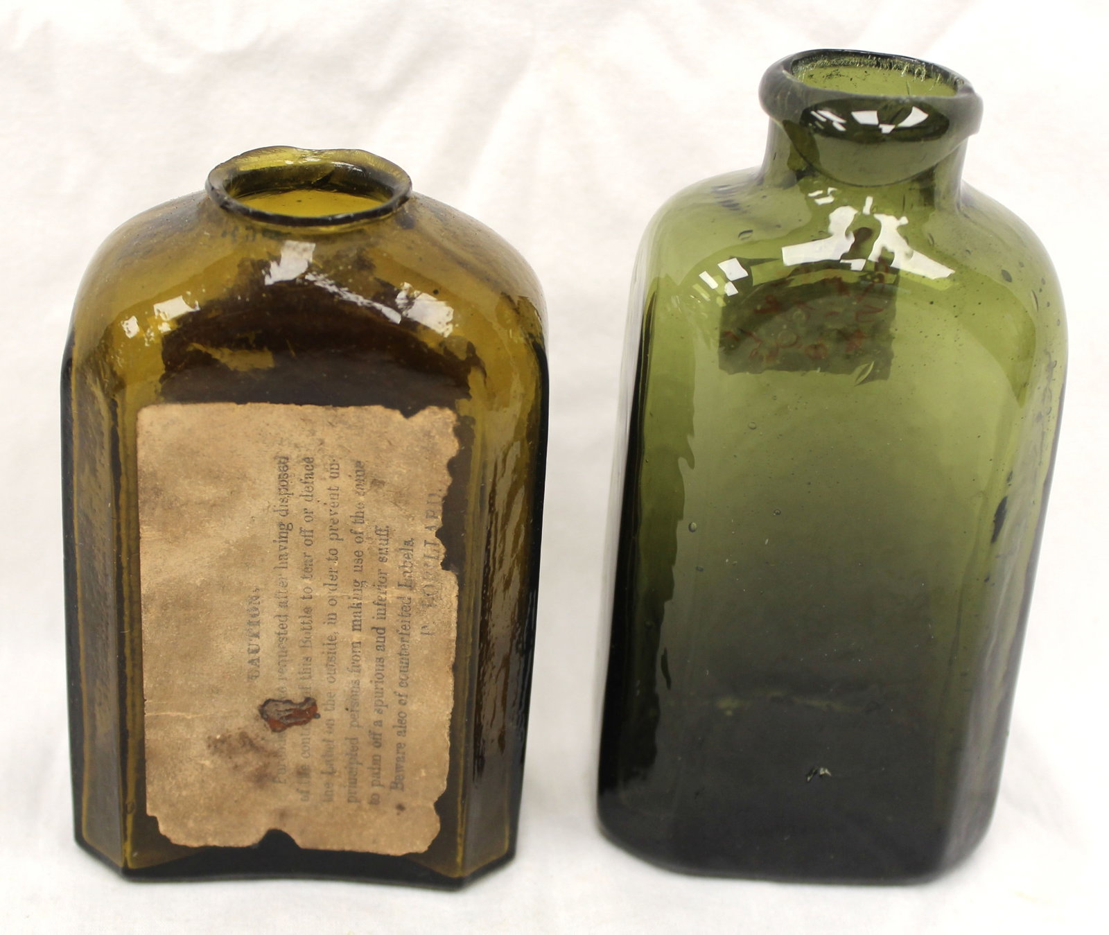 Lot of 2 early green glass small utility bottles - 1 w paper label - 4 1/2" & 5" tall (1 of 8)