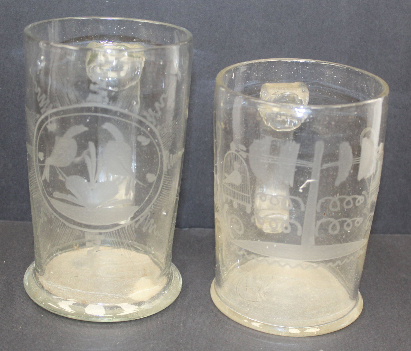 Lot of 2 early clear etched glass mugs - 6" tall x 3 1/2" & 5" tall x 3 1/2" (1 of 8)