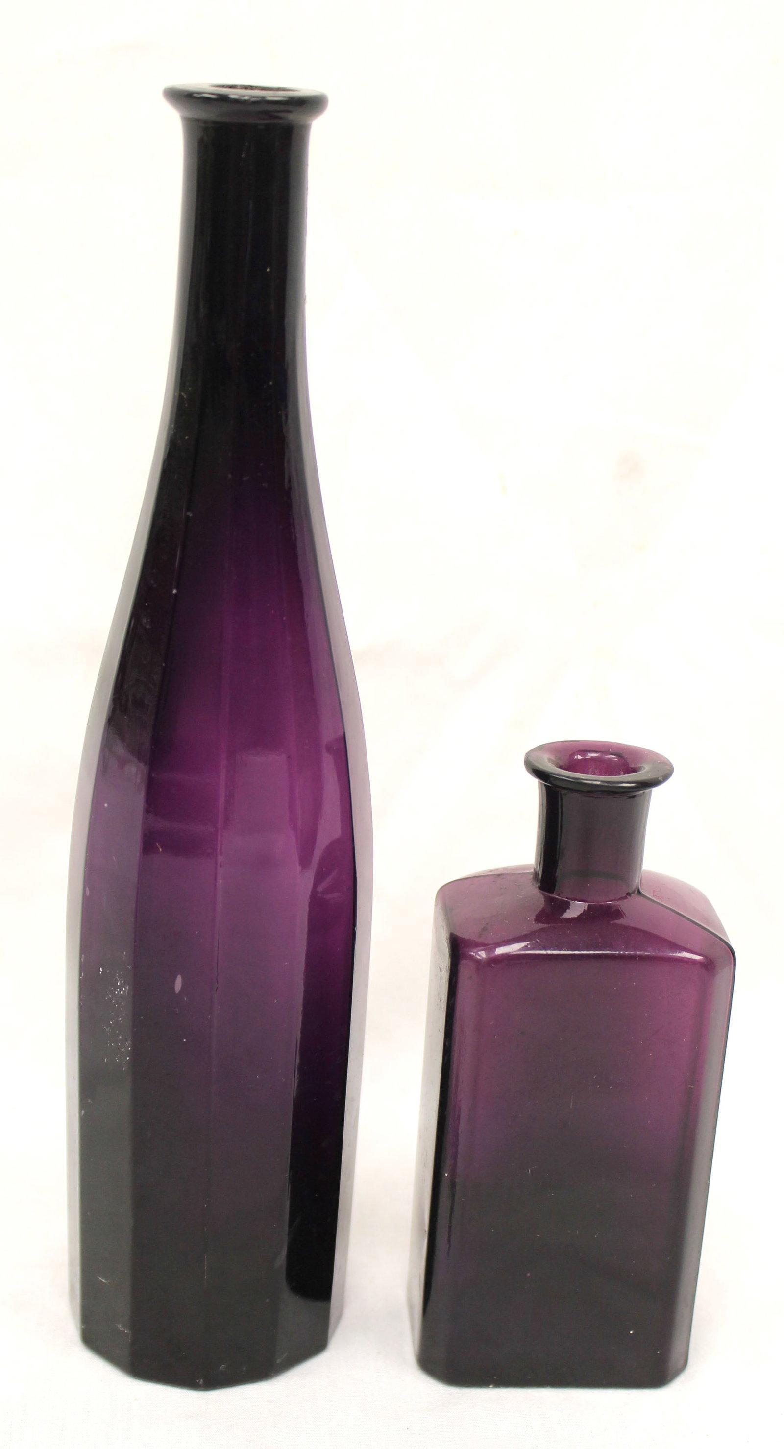 Lot of 2 early amethyst glass bottles - 4 1/2" & 9" (1 of 8)