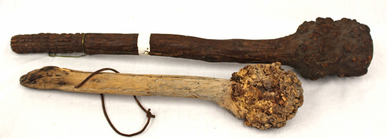 Lot of 2 antique wooden clubs - 21" & 29" long (1 of 5)