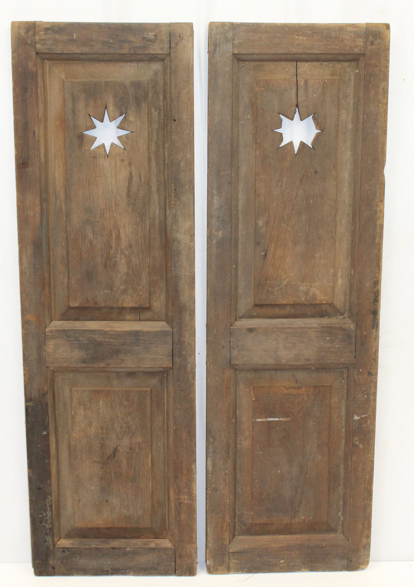 Pair of antique wooden paneled shutters w star cut outs - 41 1/2" x 13": Pair of antique wooden paneled shutters w star cut outs - 41 1/2" x 13"