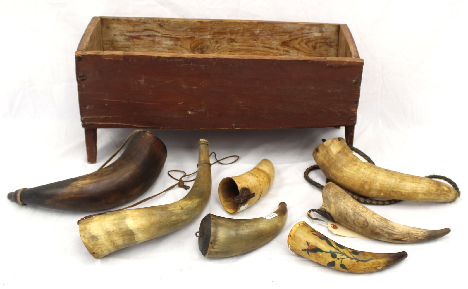 Lot of antique powder horns in an antique diminutive blanket chest w no lid - chest measures 10" (1 of 8)