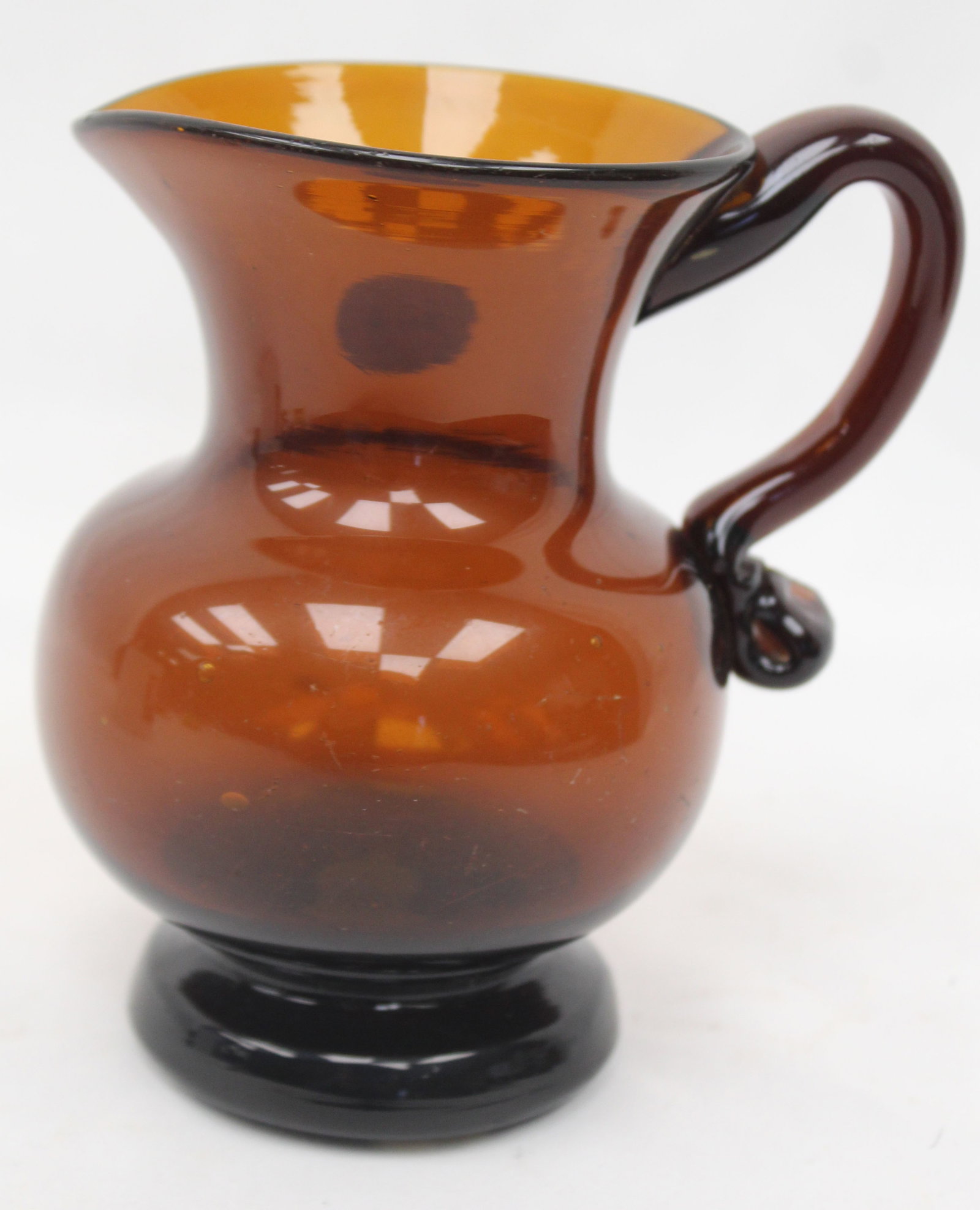 Early amber glass pitcher - 5" tall (1 of 6)