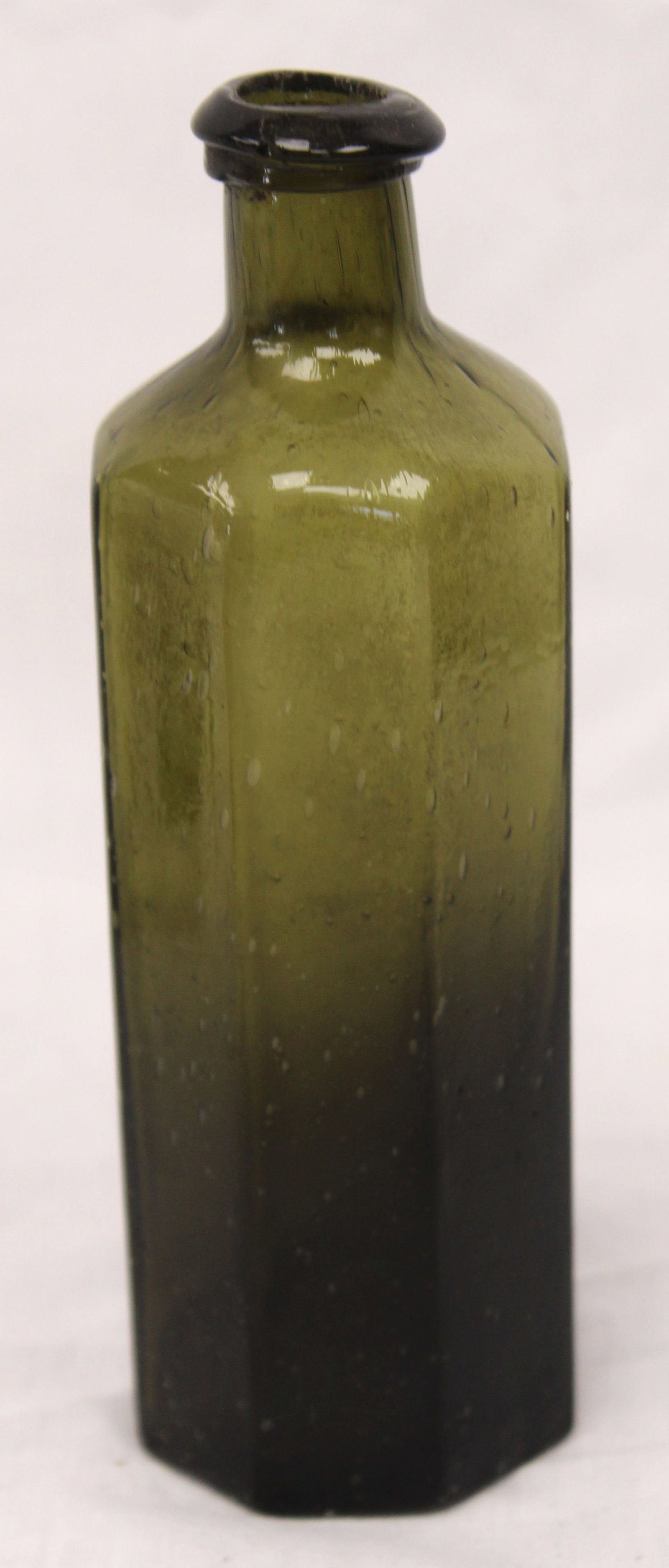 Early green glass 8 sided bottle - 6 1/4" tall: Early green glass 8 sided bottle - 6 1/4" tall