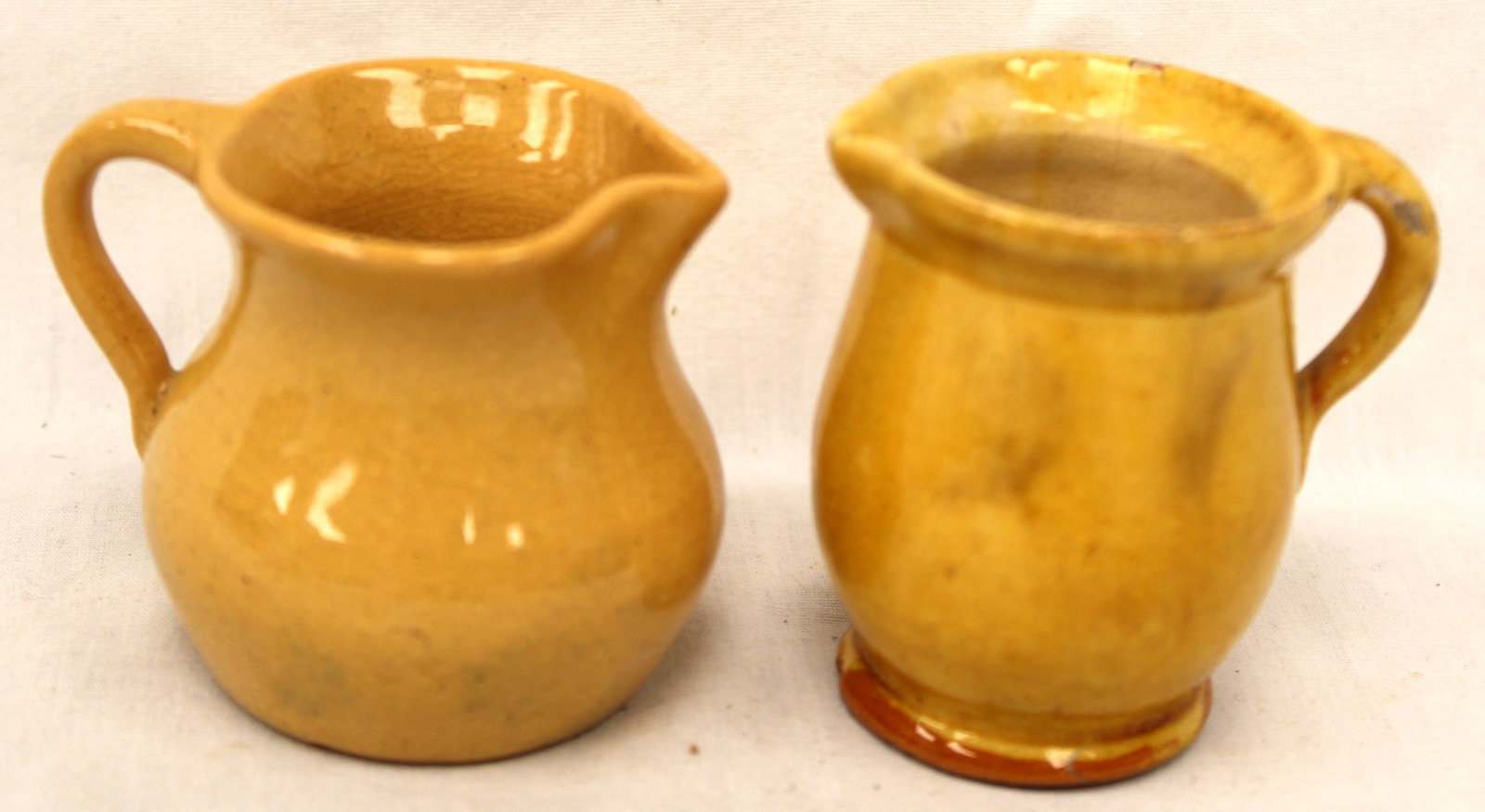 Lot of 2 miniature earthenware yellow glaze pitchers - 2 1/2" tall (1 of 7)
