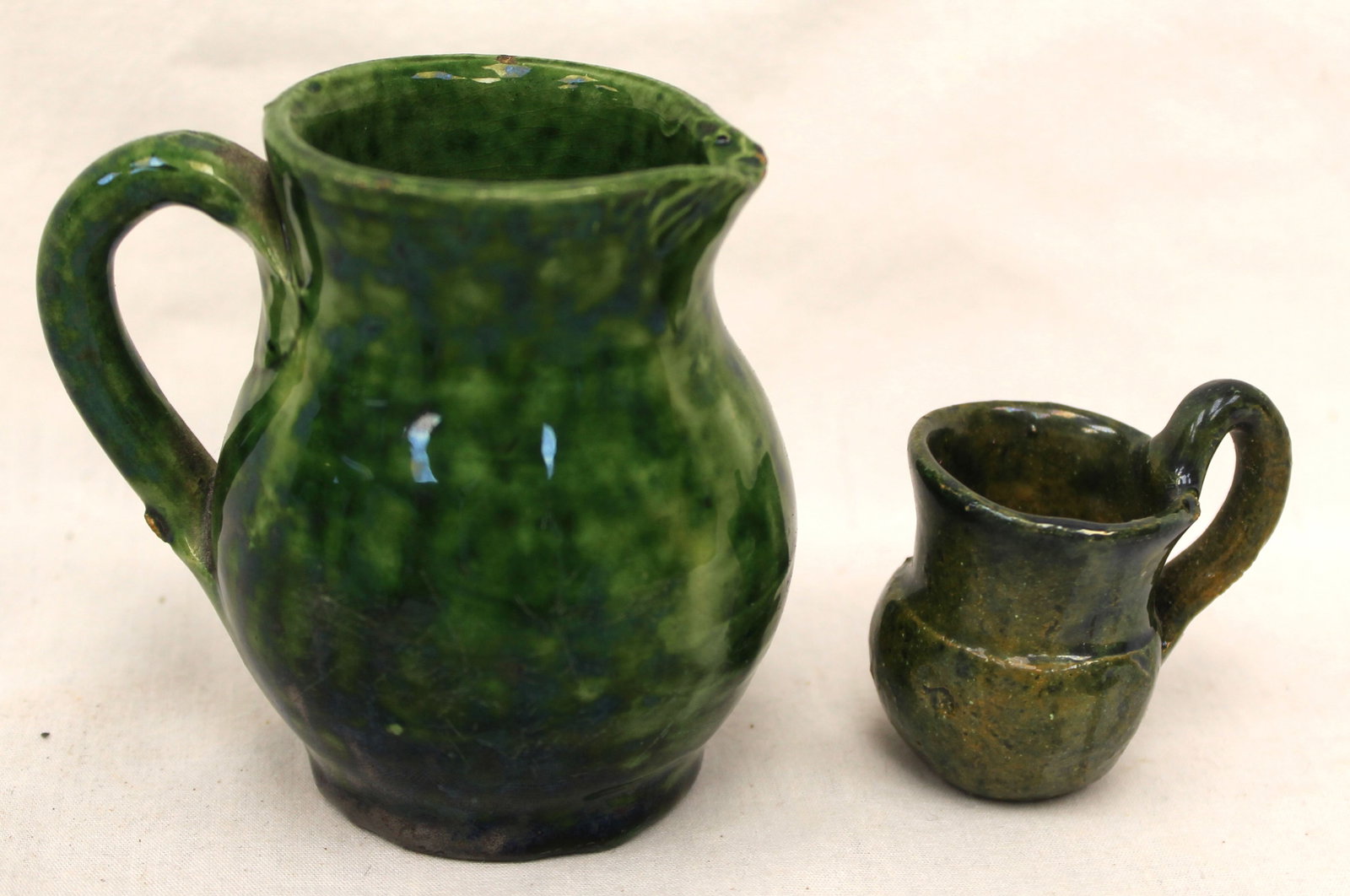 Lot of 2 miniature earthenware green glaze pitchers - 1 3/4" - 3" tall (1 of 8)