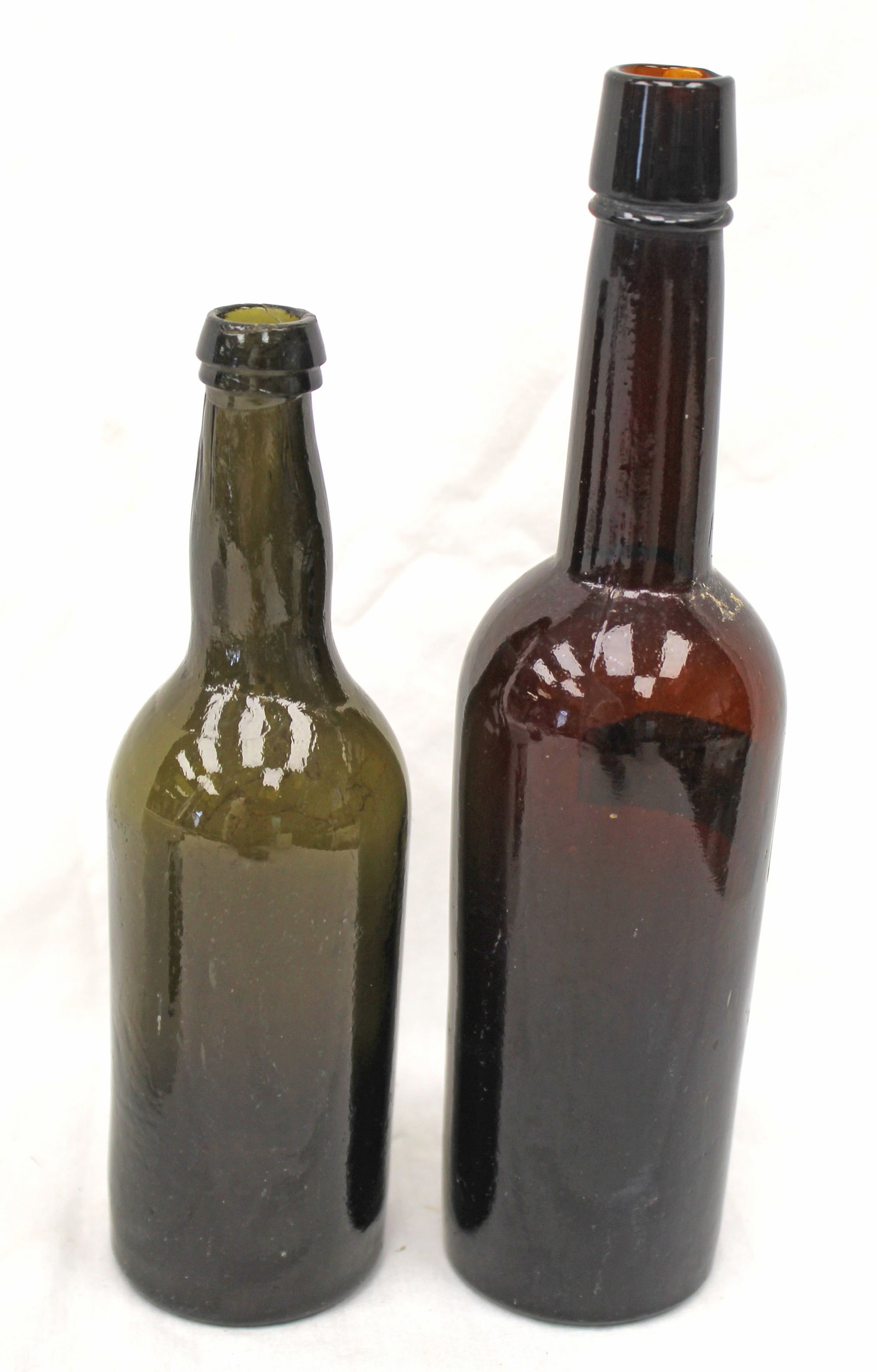 Lot of 2 early amber glass bottles - 8" & 10" tall: Lot of 2 early amber glass bottles - 8" & 10" tall