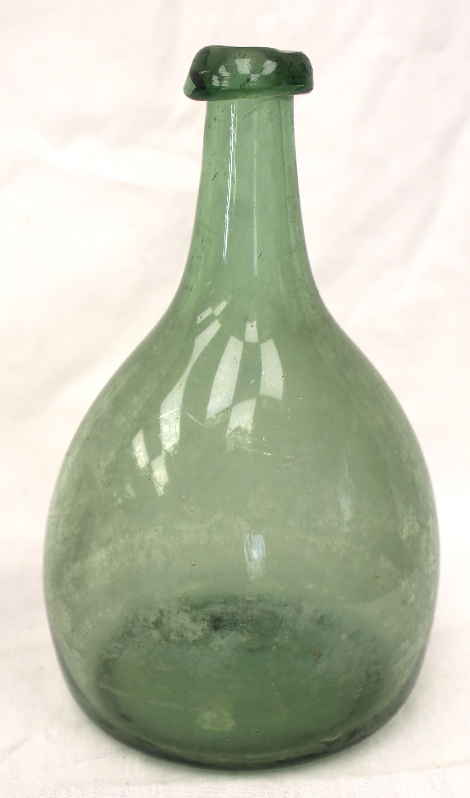 Early green glass bottle - 7 1/2" tall: Early green glass bottle - 7 1/2" tall