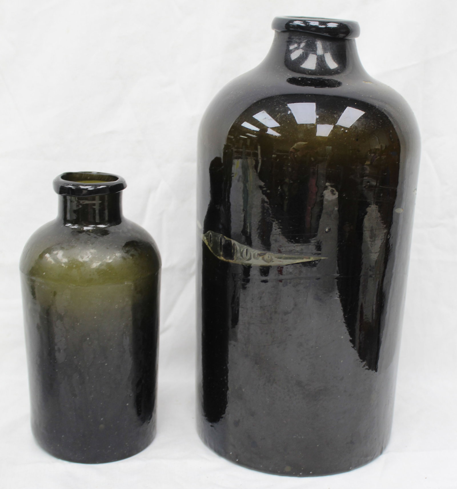 Lot of 2 early dark green glass jars - 8" & 14" tall: Lot of 2 early dark green glass jars - 8" & 14" tall