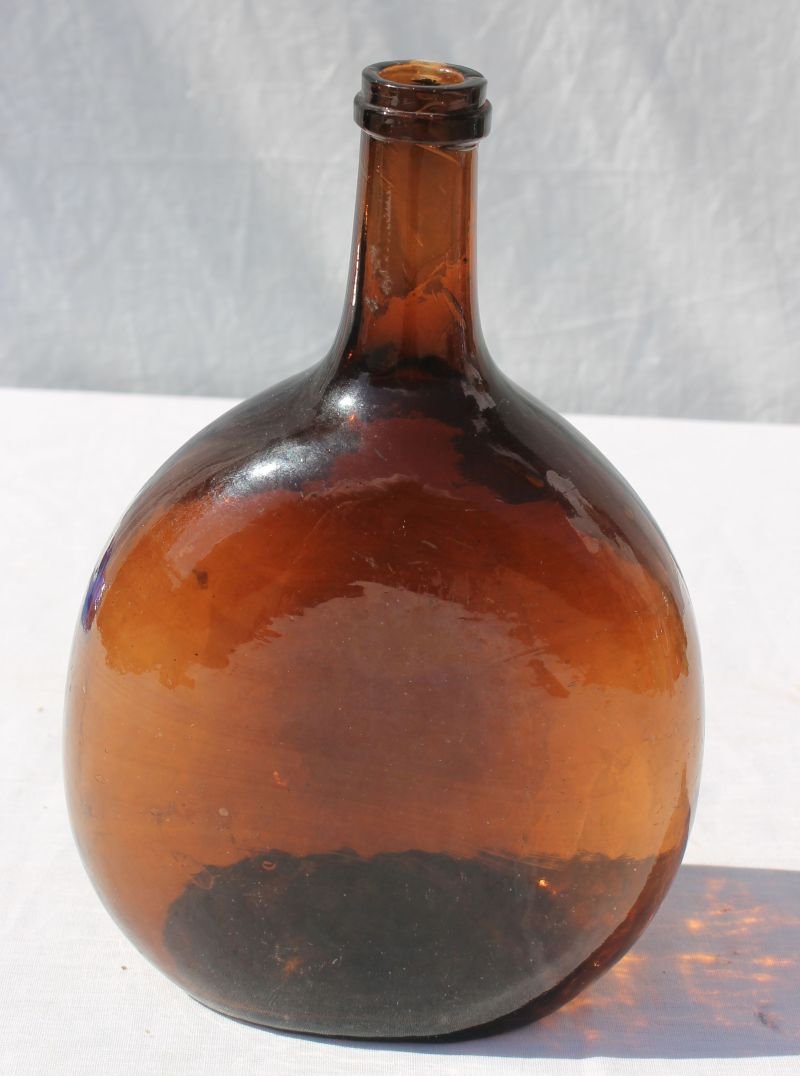 Ca 1820 8 1/2" Chestnut bottle in root beer color w: Ca 1820 8 1/2" Chestnut bottle in root beer color w great graphite pontil
