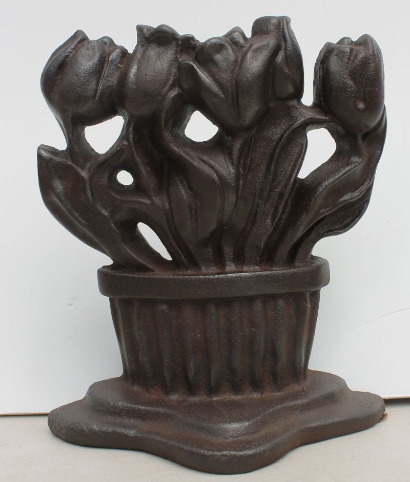 Antique cast iron 8" basket of tulips doorstop: Antique cast iron 8" basket of tulips doorstop