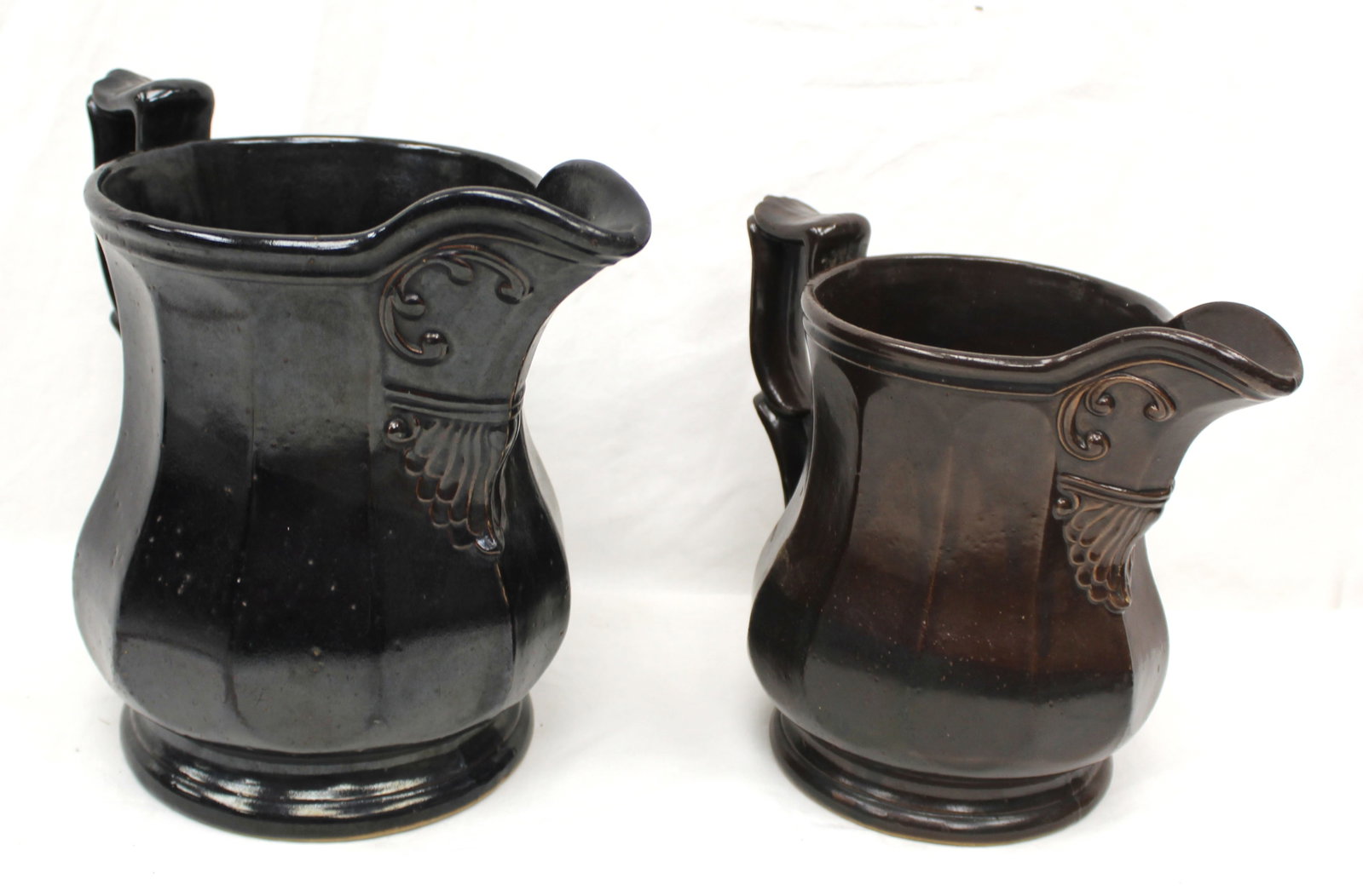 Lot of 2 antique stoneware pitchers - 10" & 8 1/2" tall: Lot of 2 antique stoneware pitchers marked JT Winslow, Portland, ME - 10" & 8 1/2" tall